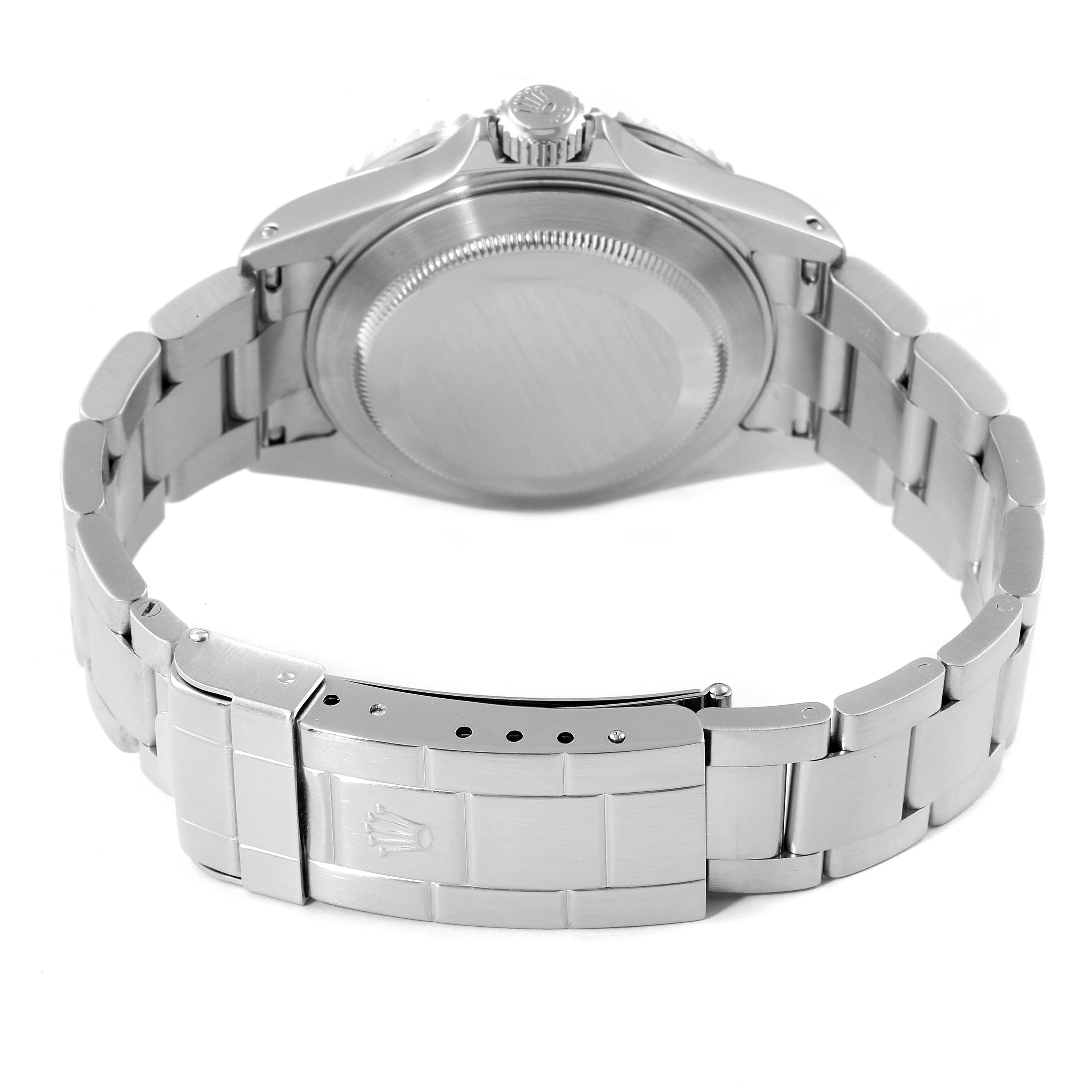 This image shows the Rolex Submariner 16610 Men
s Stainless Steel Black Dial 16610 Men
s Stainless Steel Black Dial watch from the back, highlighting the case back, bracelet, and clasp.