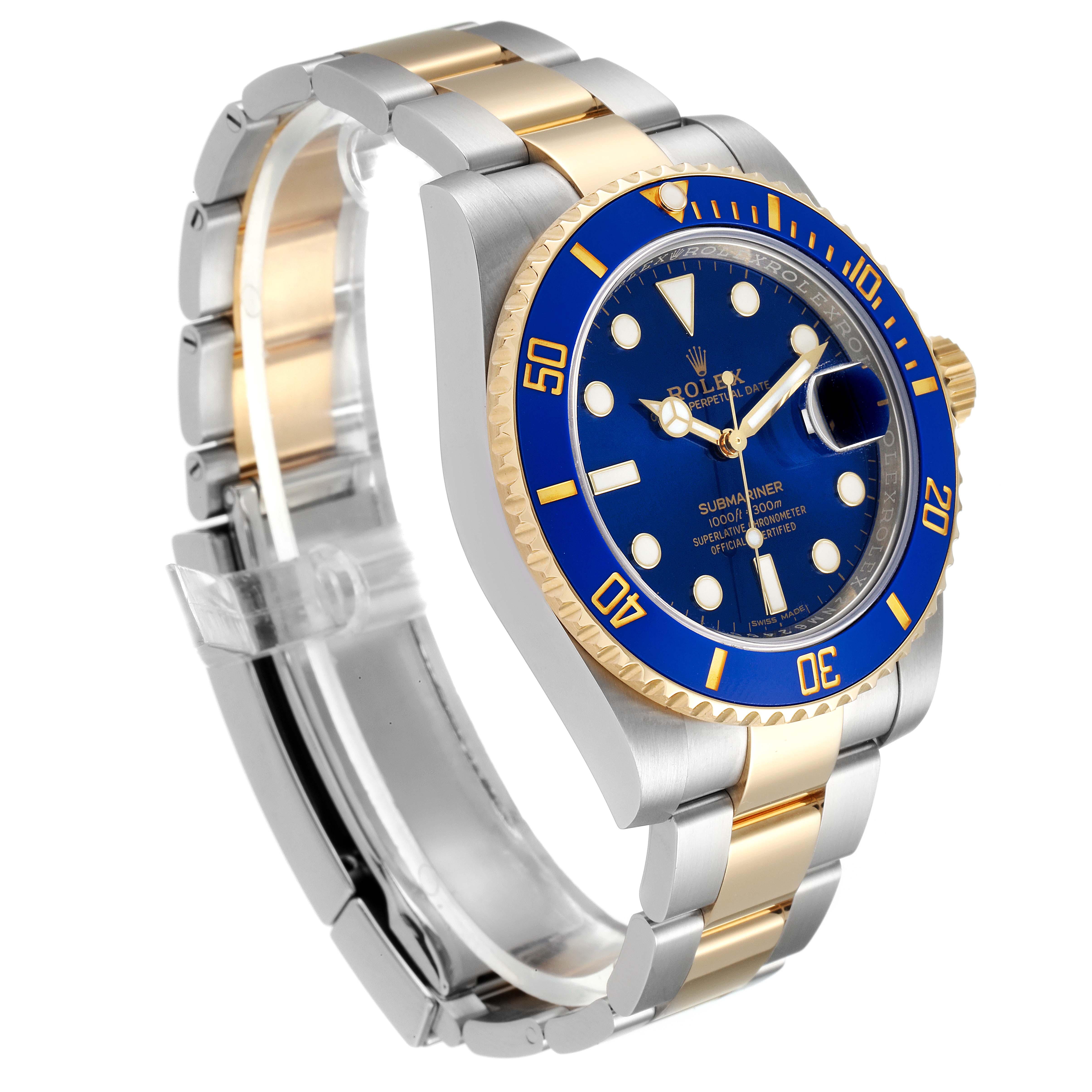 This image shows a Rolex Submariner 116613 Men
s Steel and Gold (two tone) Blue Dial 116613 Men
s Steel and Gold (two tone) Blue Dial watch at a slight angle, highlighting the blue dial, bezel, and two-tone (gold and silver) bracelet.