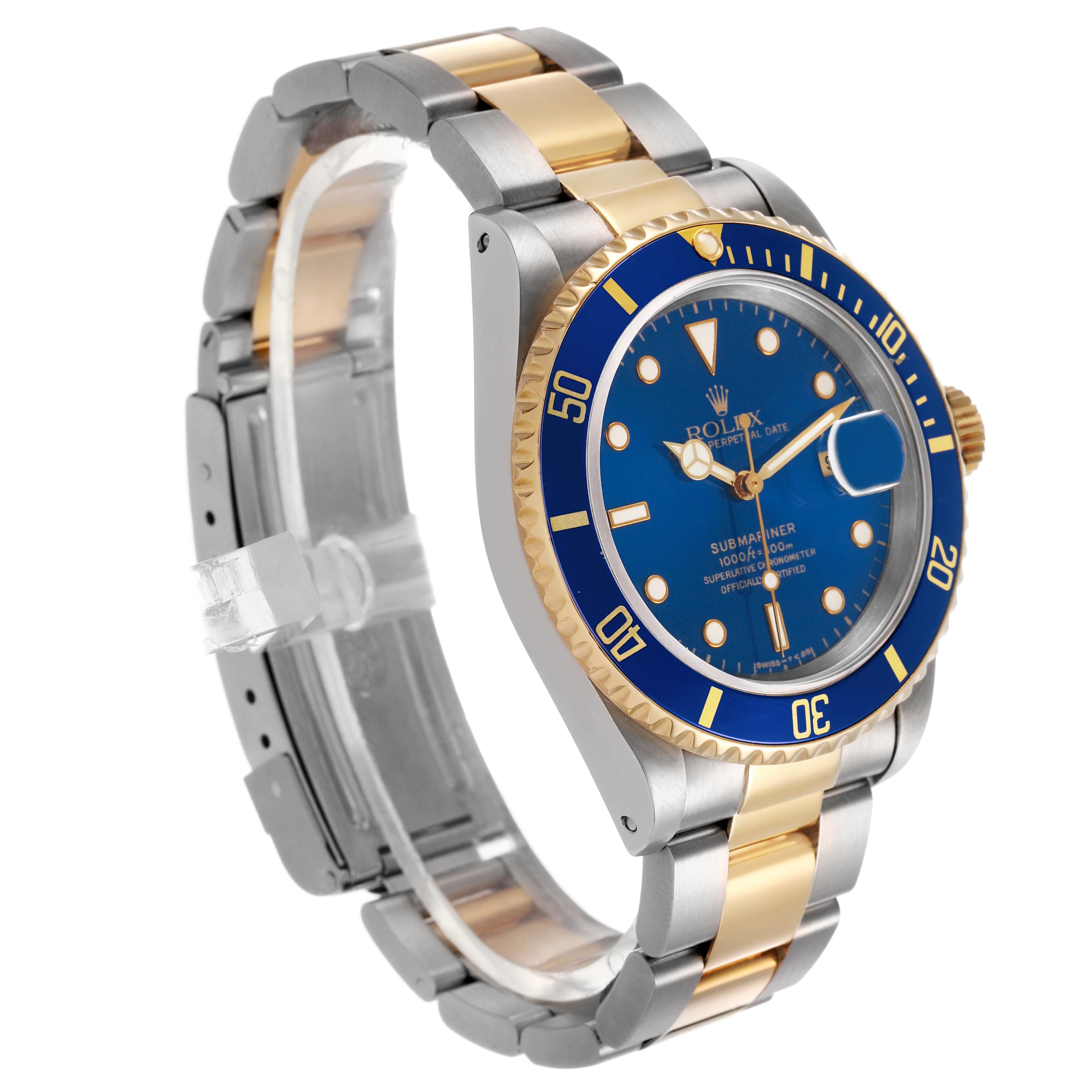 The Rolex Submariner 16613LB Men's Stainless Steel Blue Dial watch is shown at a side angle, highlighting the blue dial, gold and silver bracelet, and bezel.