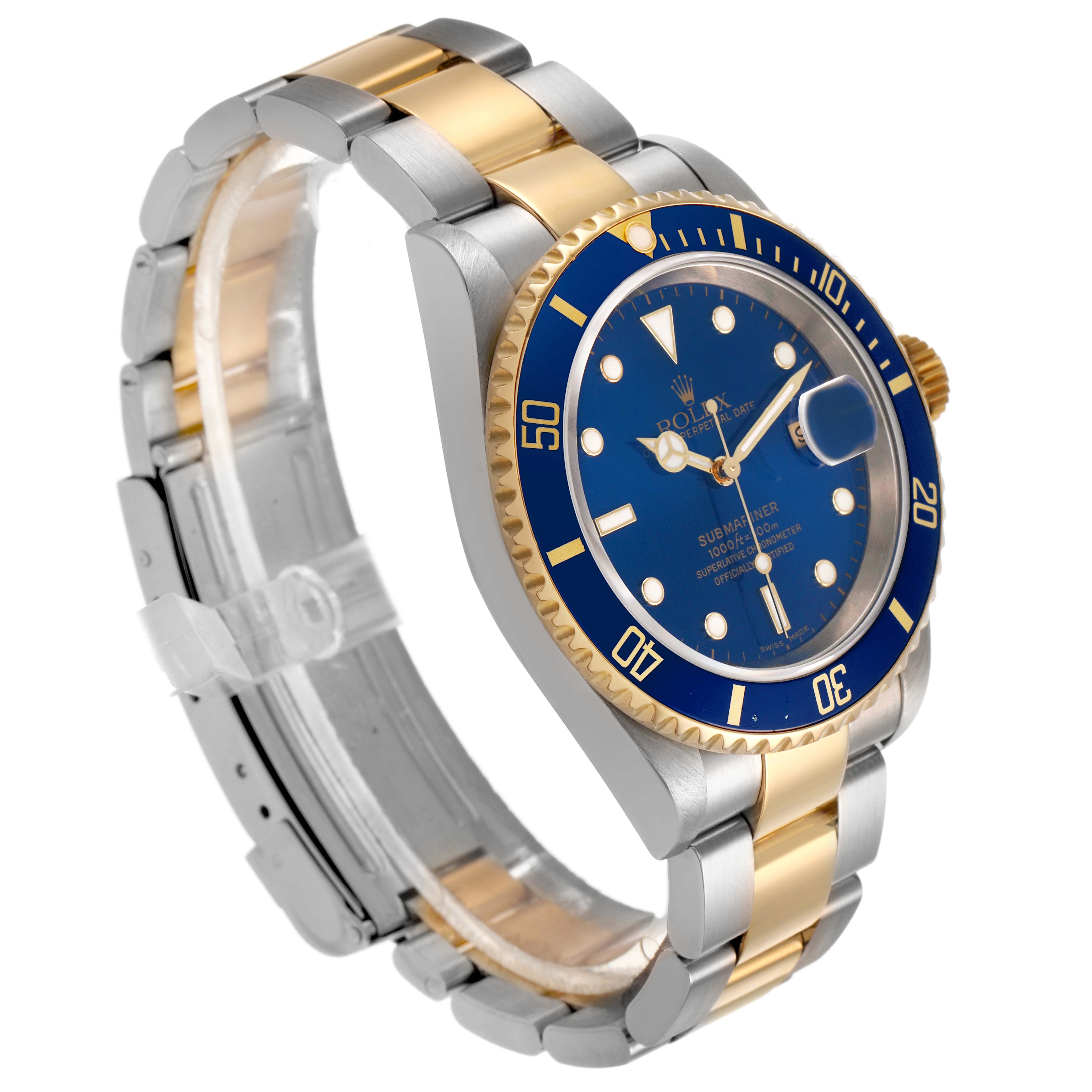 The Rolex Submariner 16613LB Men's Steel and Gold (two tone) Blue Dial watch is shown at an angle highlighting the case, blue bezel, dial, and two-tone bracelet.