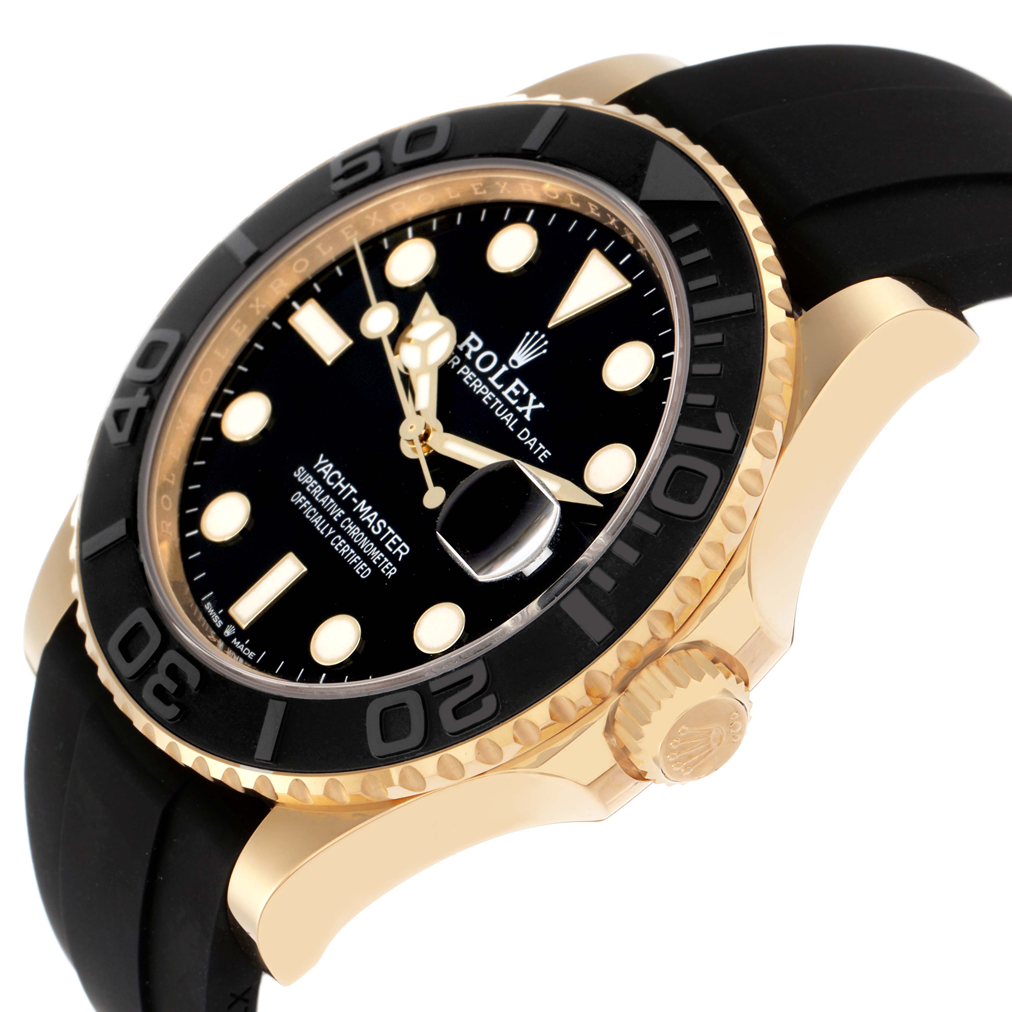The Rolex Yacht-Master model 226658 is shown at an angle highlighting the black bezel, gold case, black dial, and crown, with a side view of the black strap.