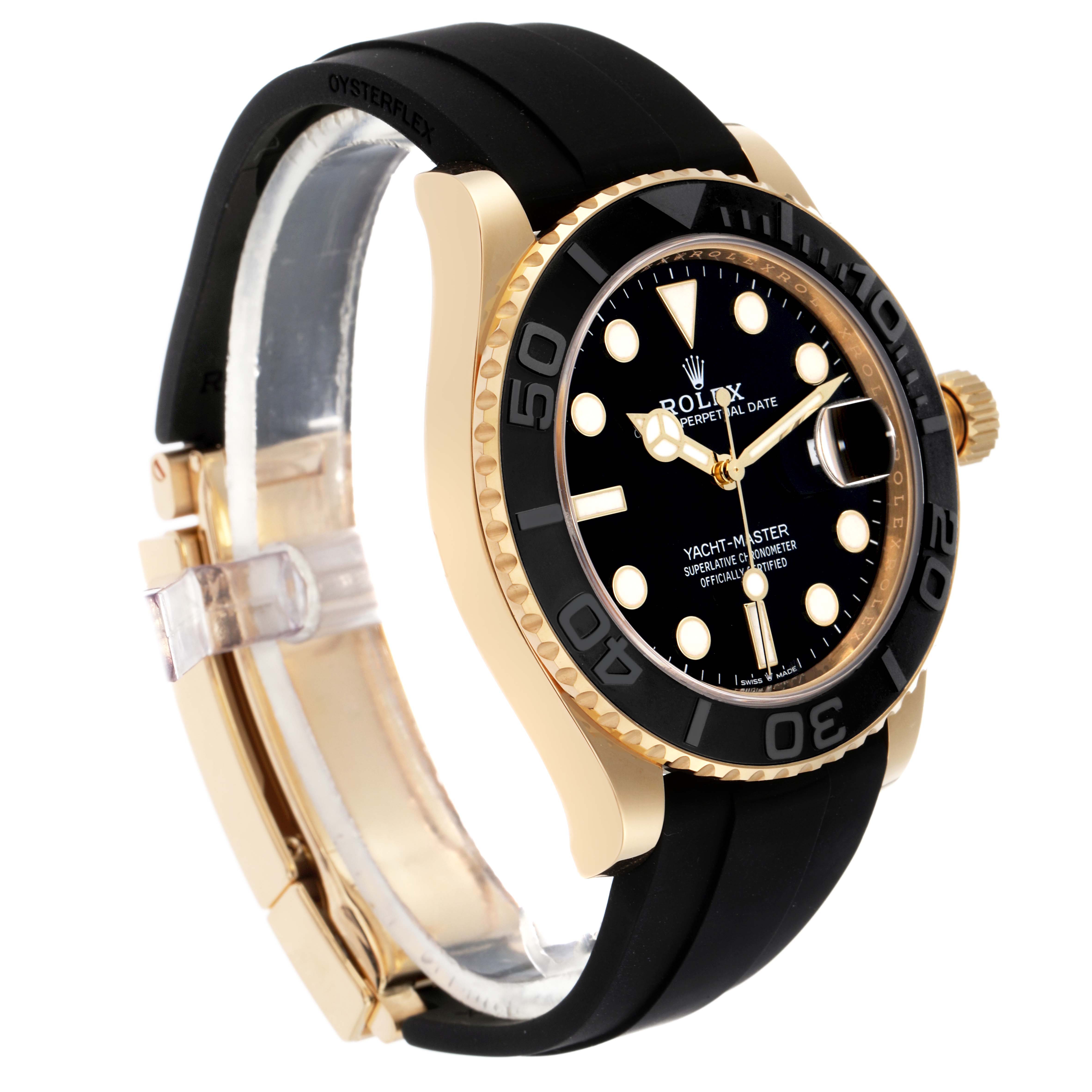 The image shows a side view of the Rolex Yacht-Master model 226658, displaying the black dial, golden bezel, and black Oysterflex strap.