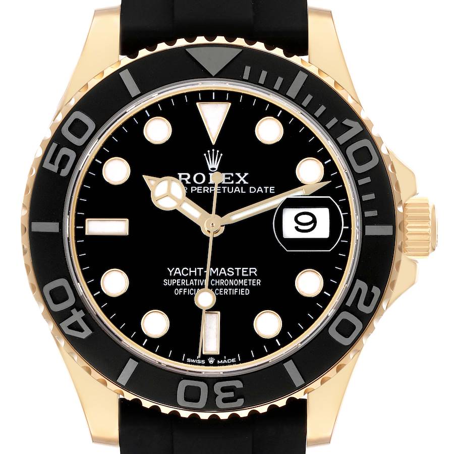 The Rolex Yacht-Master model 226658 is shown from a front angle, highlighting its black dial, gold case, and black bezel with a rubber strap.