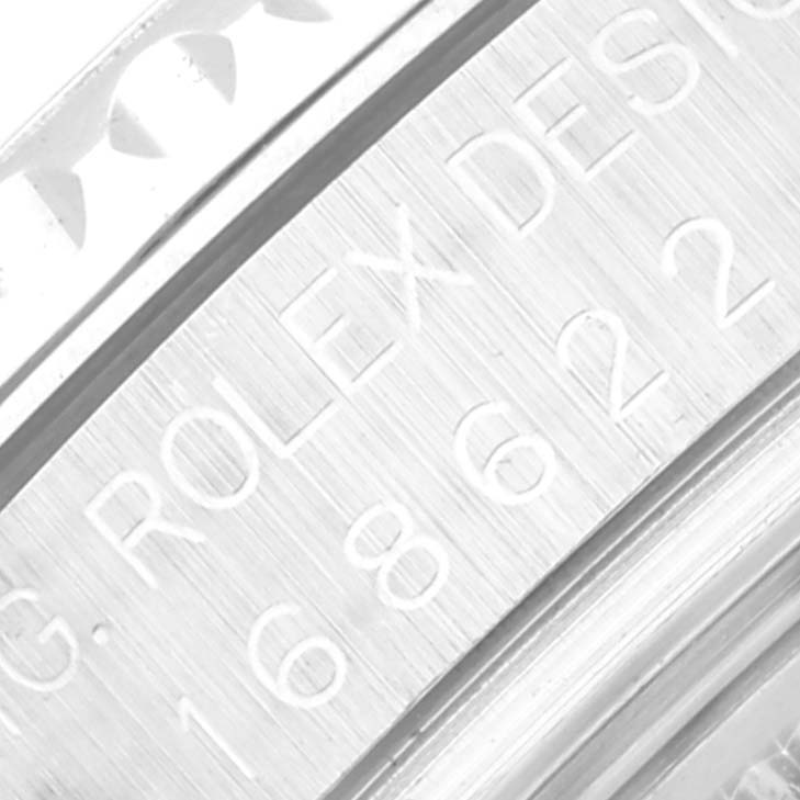 This close-up image shows the engraved bezel and serial number on a Rolex Yacht-Master 168622 Men's Stainless Steel Grey Dial 168622 Men's Stainless Steel Grey Dial watch.