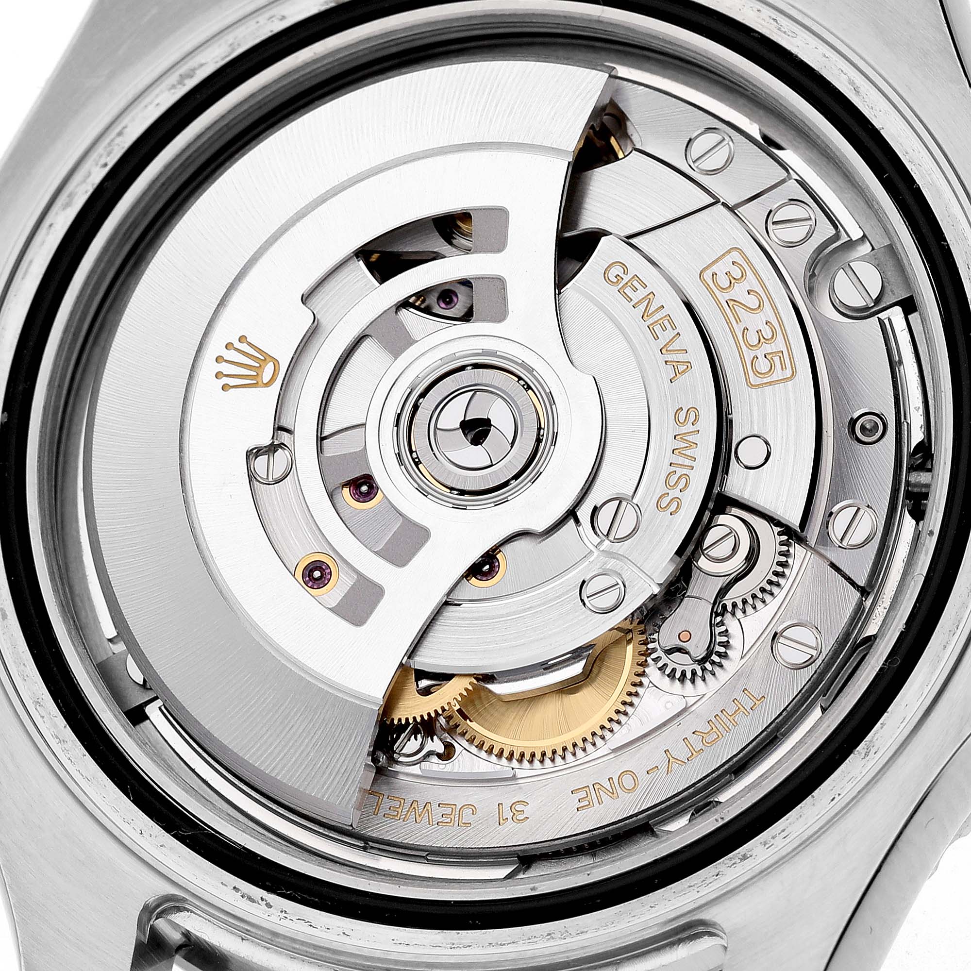 The image shows a close-up of the Rolex Yacht-Master M126622-0001 Men's Stainless Steel Grey Dial's movement, highlighting the rotor, gears, and engravings.