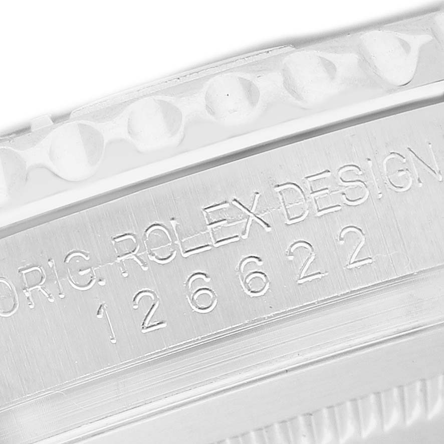 The image shows a close-up of the engraved side of the Rolex Yacht-Master M126622-0001 Men's Stainless Steel Grey Dial watch case, highlighting its model number and design details.