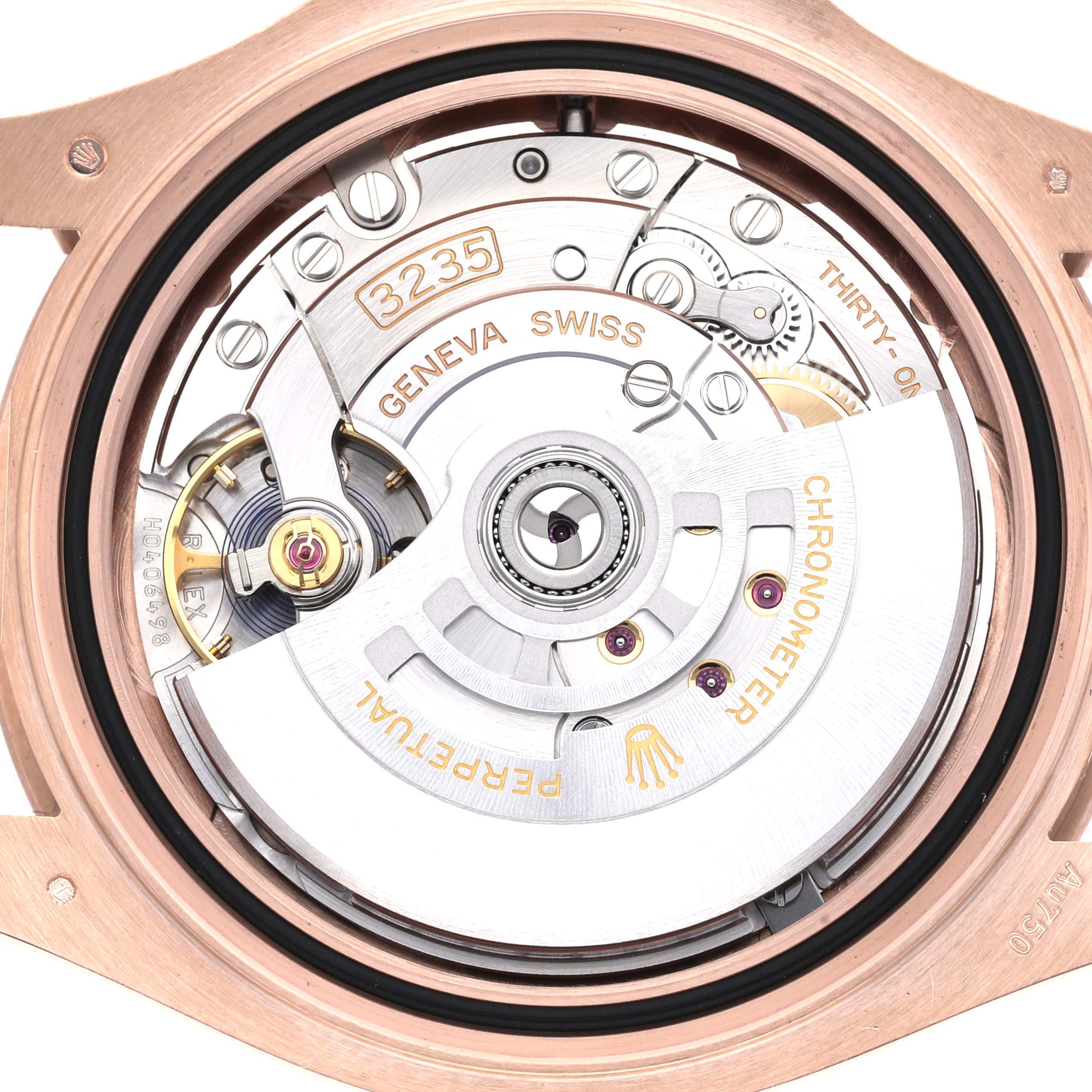 The image shows a close-up of the Rolex Yacht-Master model 126655's movement from the back, highlighting the intricate mechanical components and inscriptions.
