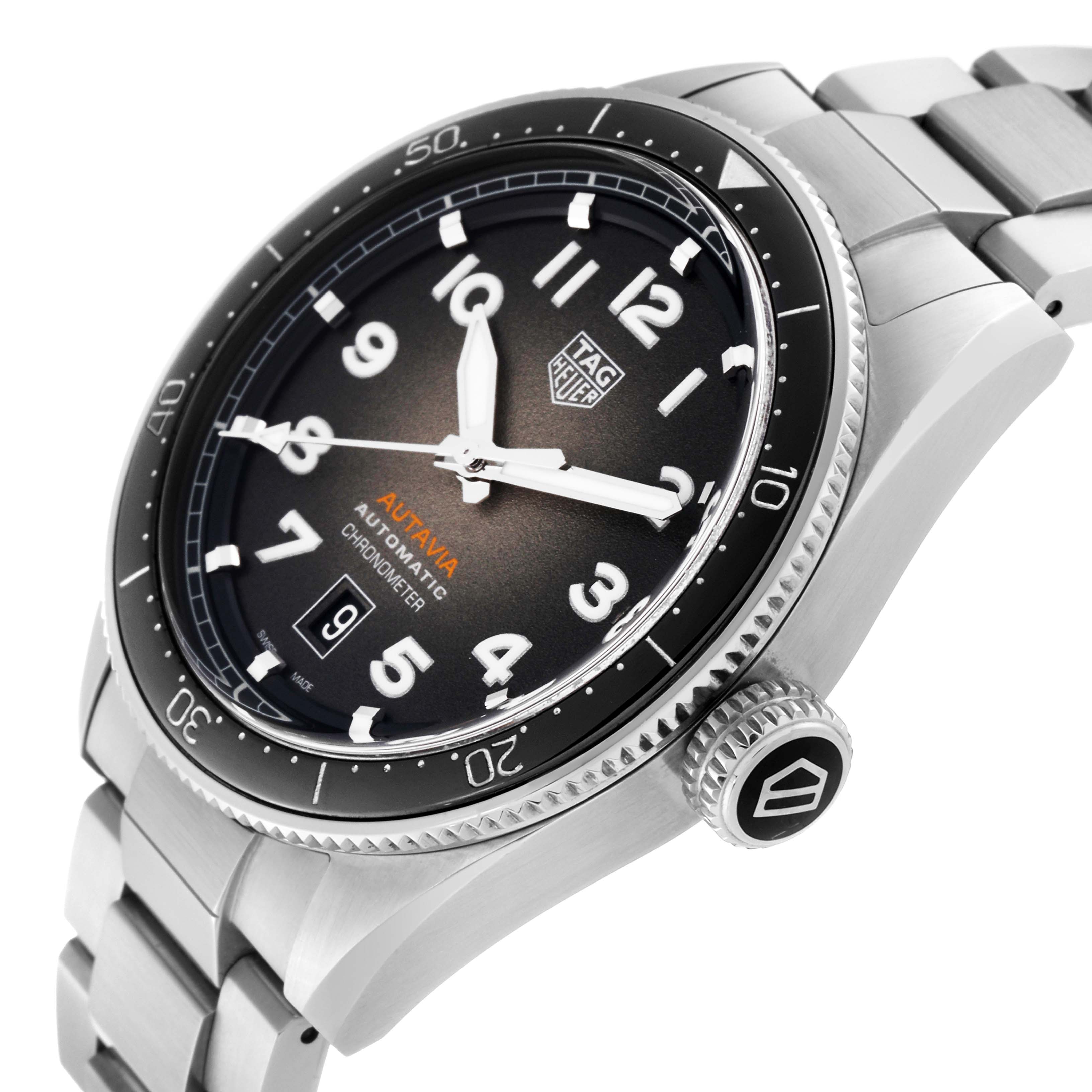 The image shows a close-up angle of the Tag Heuer Autavia 63464 Men's Stainless Steel Brown Dial 63464 Men's Stainless Steel Brown Dial watch, highlighting the dial, bezel, crown, and part of the bracelet.