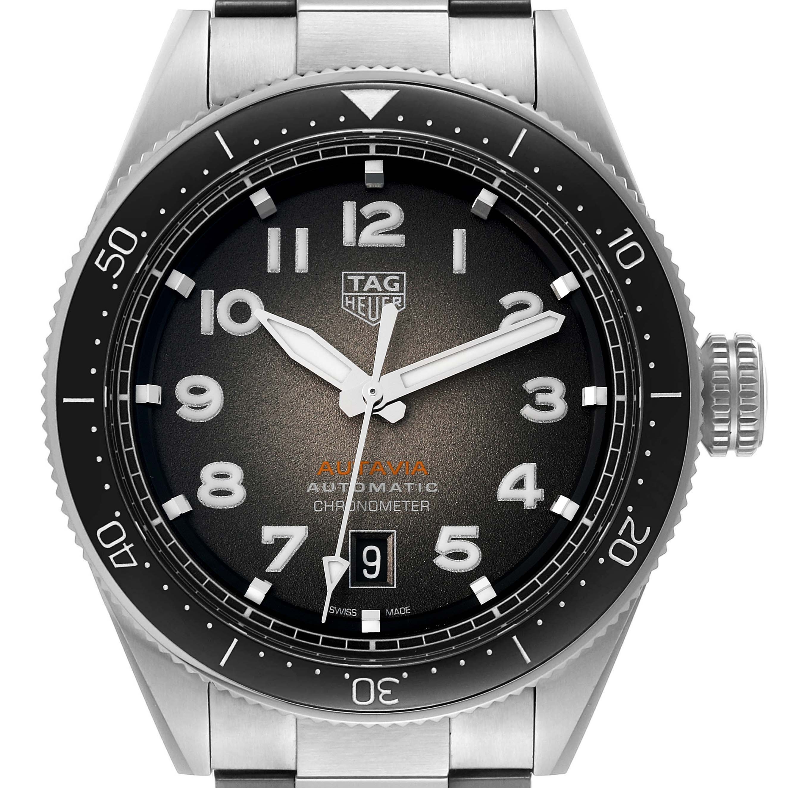 The image shows a front view of the Tag Heuer Autavia 63464 Men's Stainless Steel Brown Dial 63464 Men's Stainless Steel Brown Dial model watch, highlighting its dial, bezel, and date window.