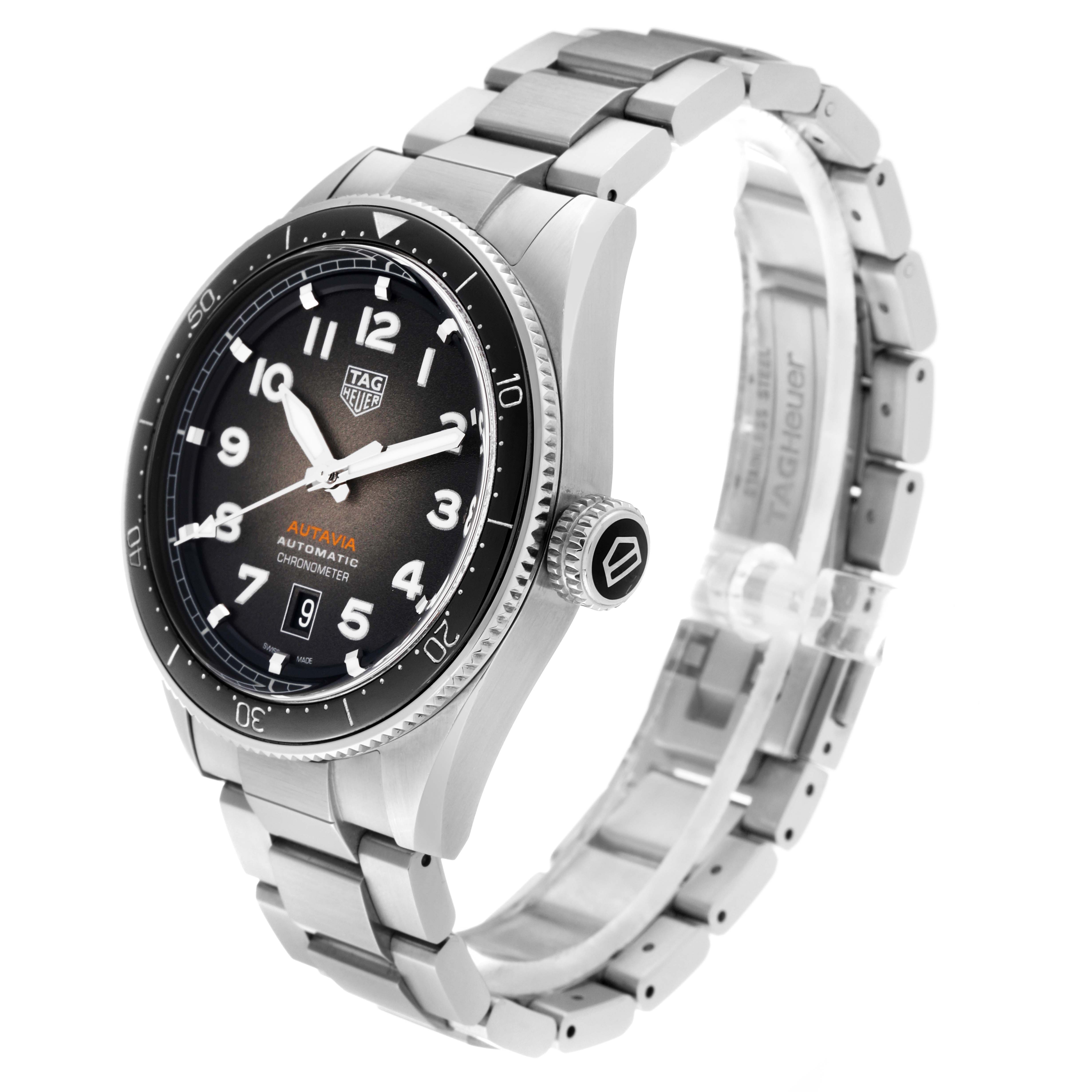 The image shows a Tag Heuer Autavia 63464 Men's Stainless Steel Brown Dial 63464 Men's Stainless Steel Brown Dial watch at a slight angle, highlighting the face, bezel, crown, and stainless steel bracelet.