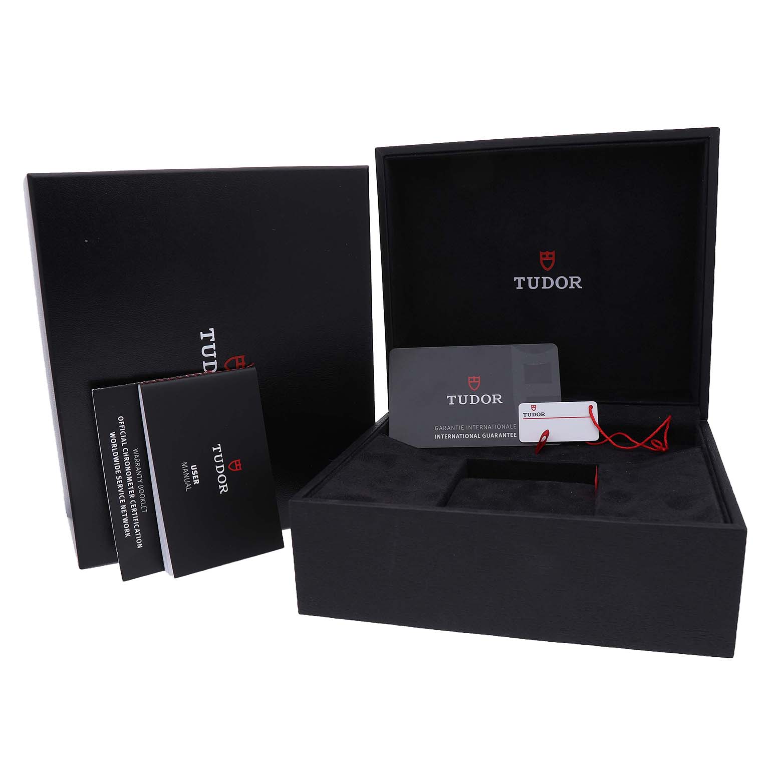 The image shows Tudor Heritage Black Bay M79030N-0001 Men's Stainless Steel Black Dial packaging, including the box, manuals, and warranty card.