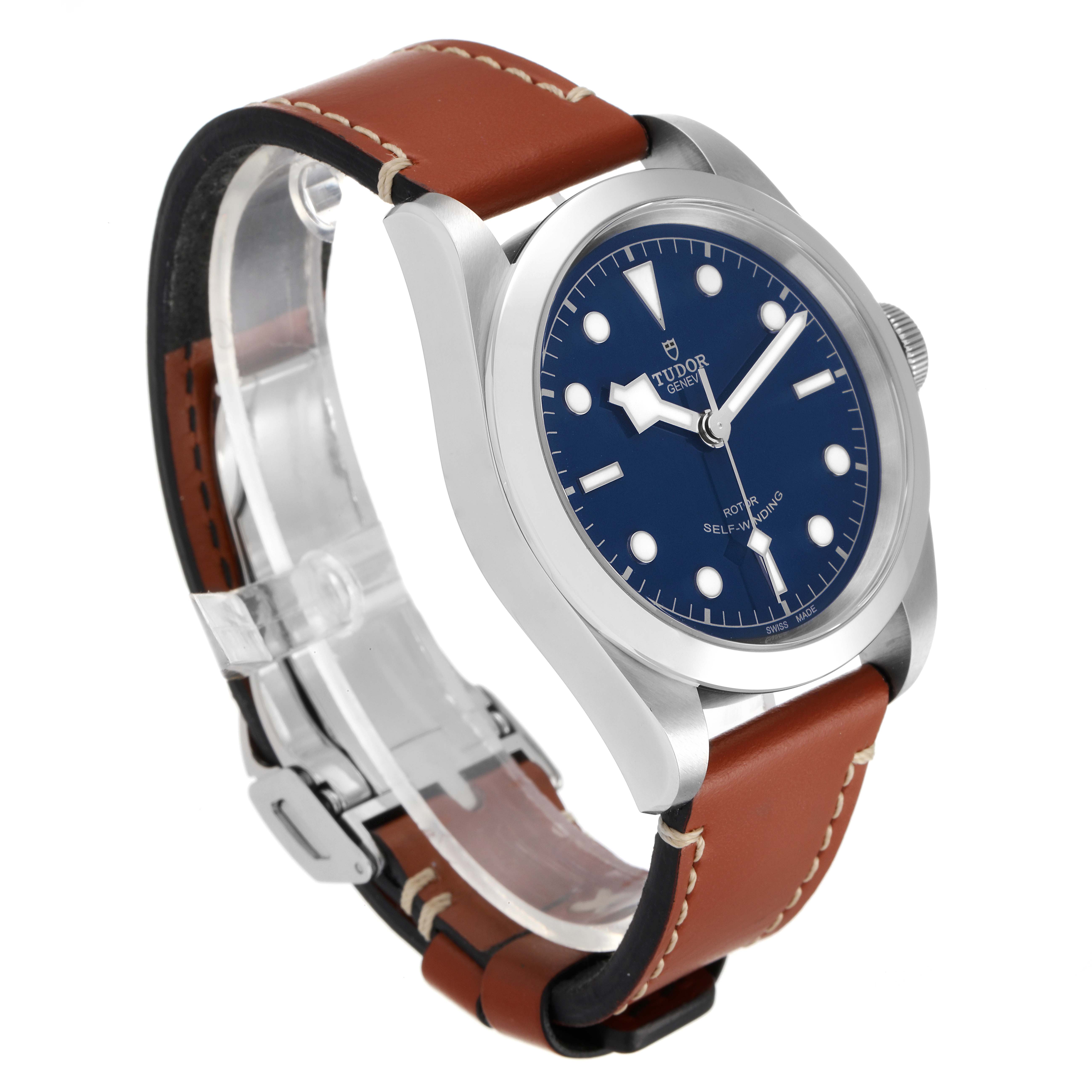 This image shows a Tudor Heritage Black Bay 79540 Men's Stainless Steel Blue Dial 79540 Men's Stainless Steel Blue Dial watch at a three-quarter angle, highlighting its blue dial and brown leather strap.