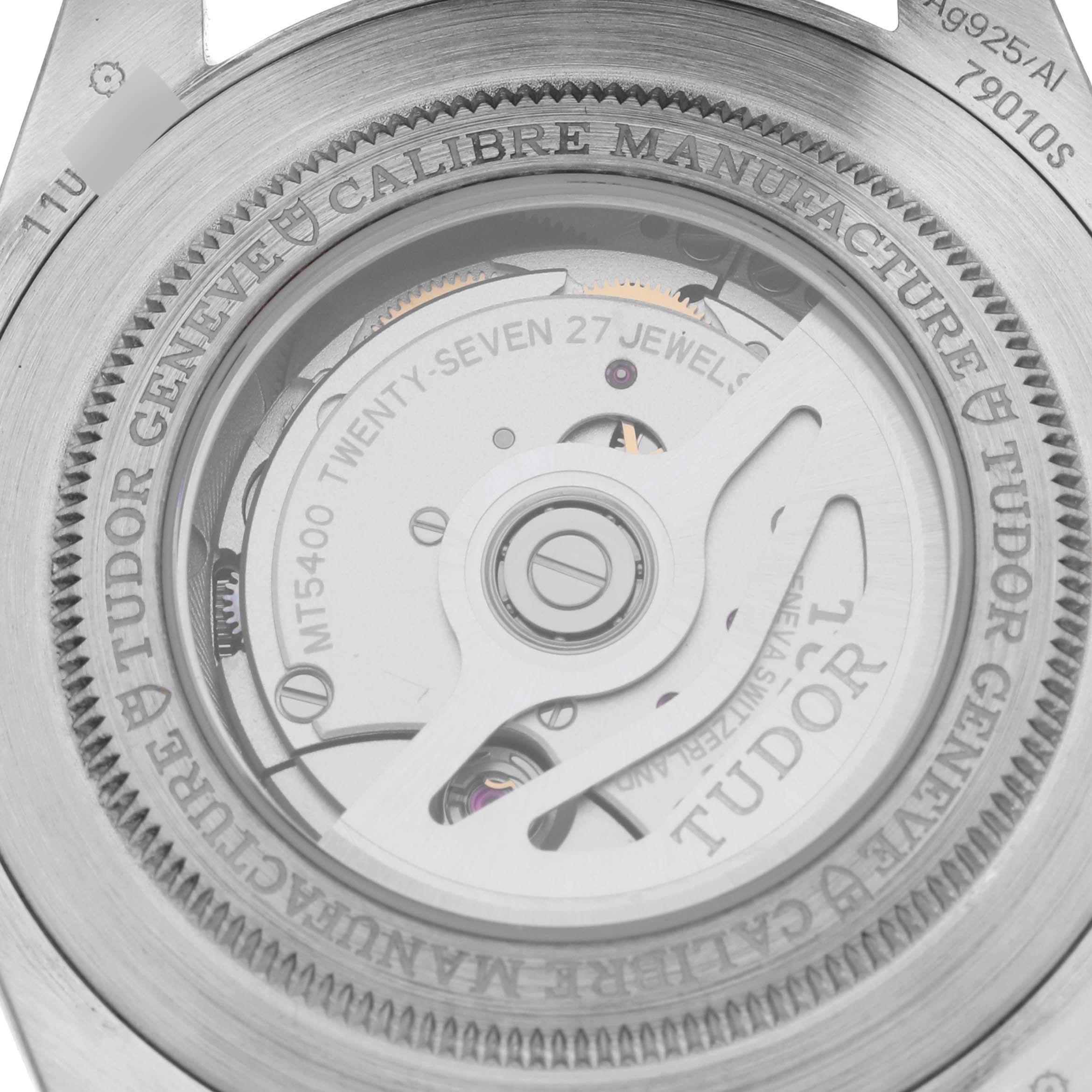 This image shows a close-up of the case back and movement of the Tudor Heritage Black Bay M79010SG-0002 Men's Stainless Steel Grey Dial M79010SG-0002 Men's Stainless Steel Grey Dial watch, highlighting the Calibre Manufacture.