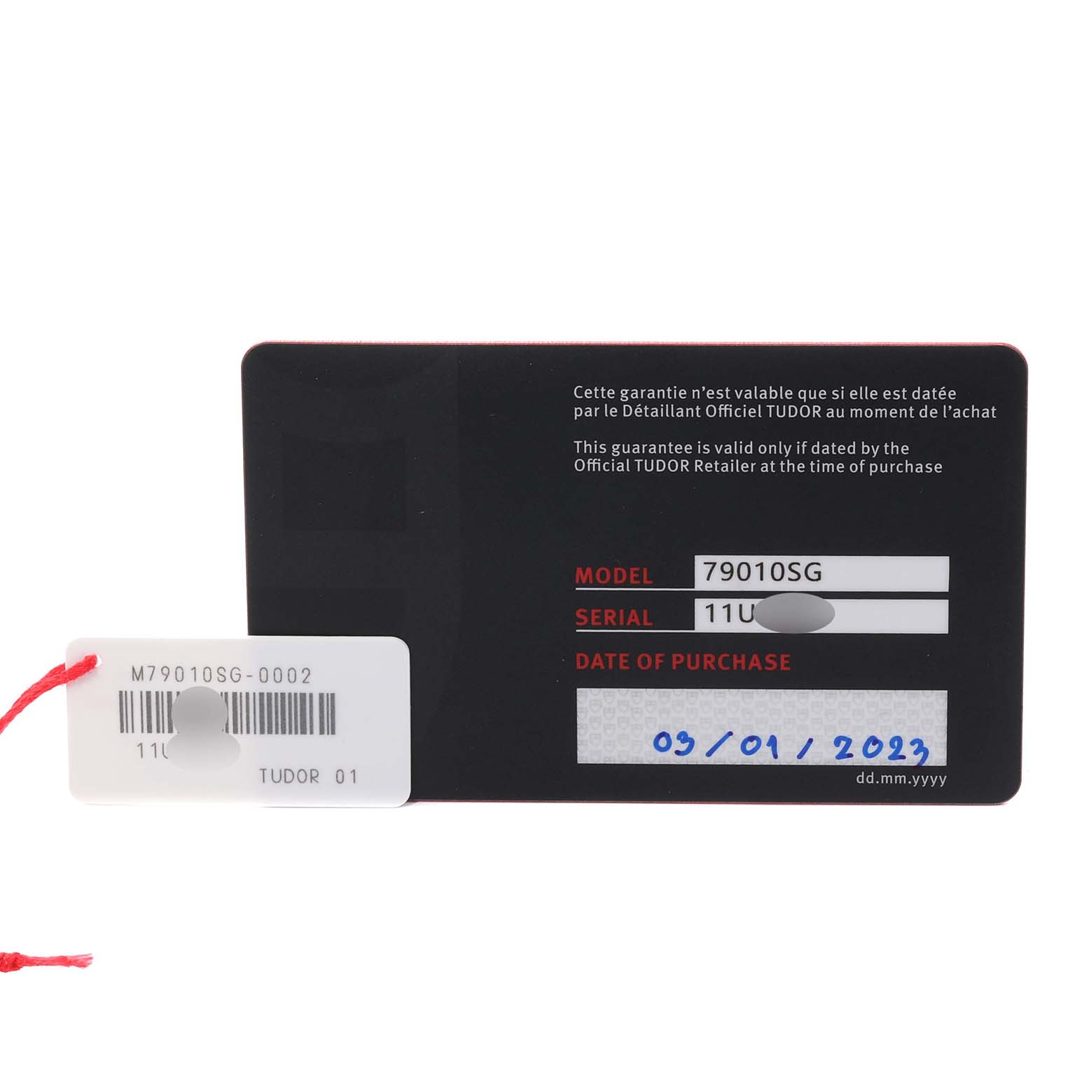 This image shows the guarantee card and hang tag for the Tudor Heritage Black Bay M79010SG-0002 Men's Stainless Steel Grey Dial M79010SG-0002 Men's Stainless Steel Grey Dial model 79010SG.