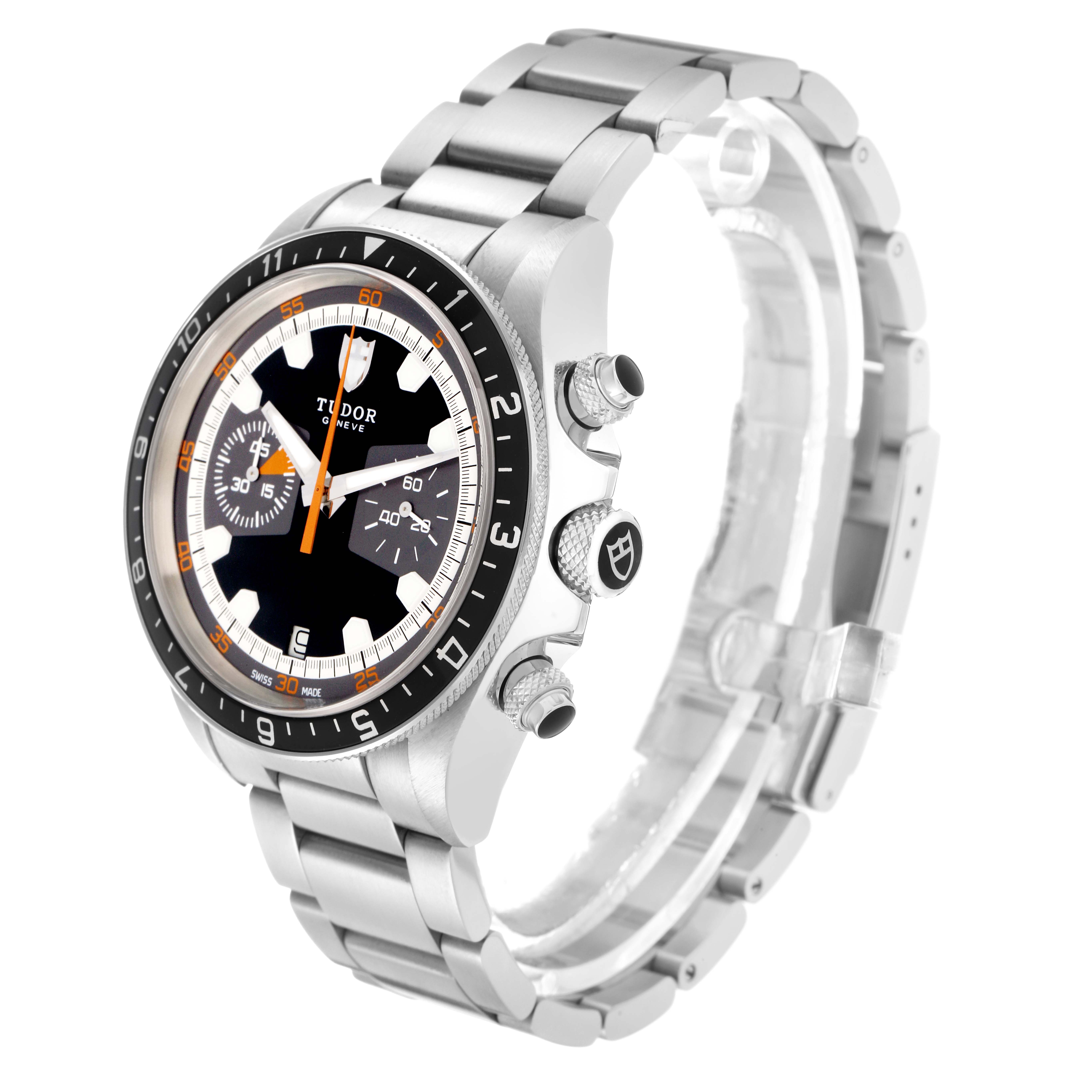 The Tudor Heritage Chrono Model 70330N-65740 is shown at a three-quarter angle, highlighting its dial, bezel, crown, pushers, and stainless steel bracelet.