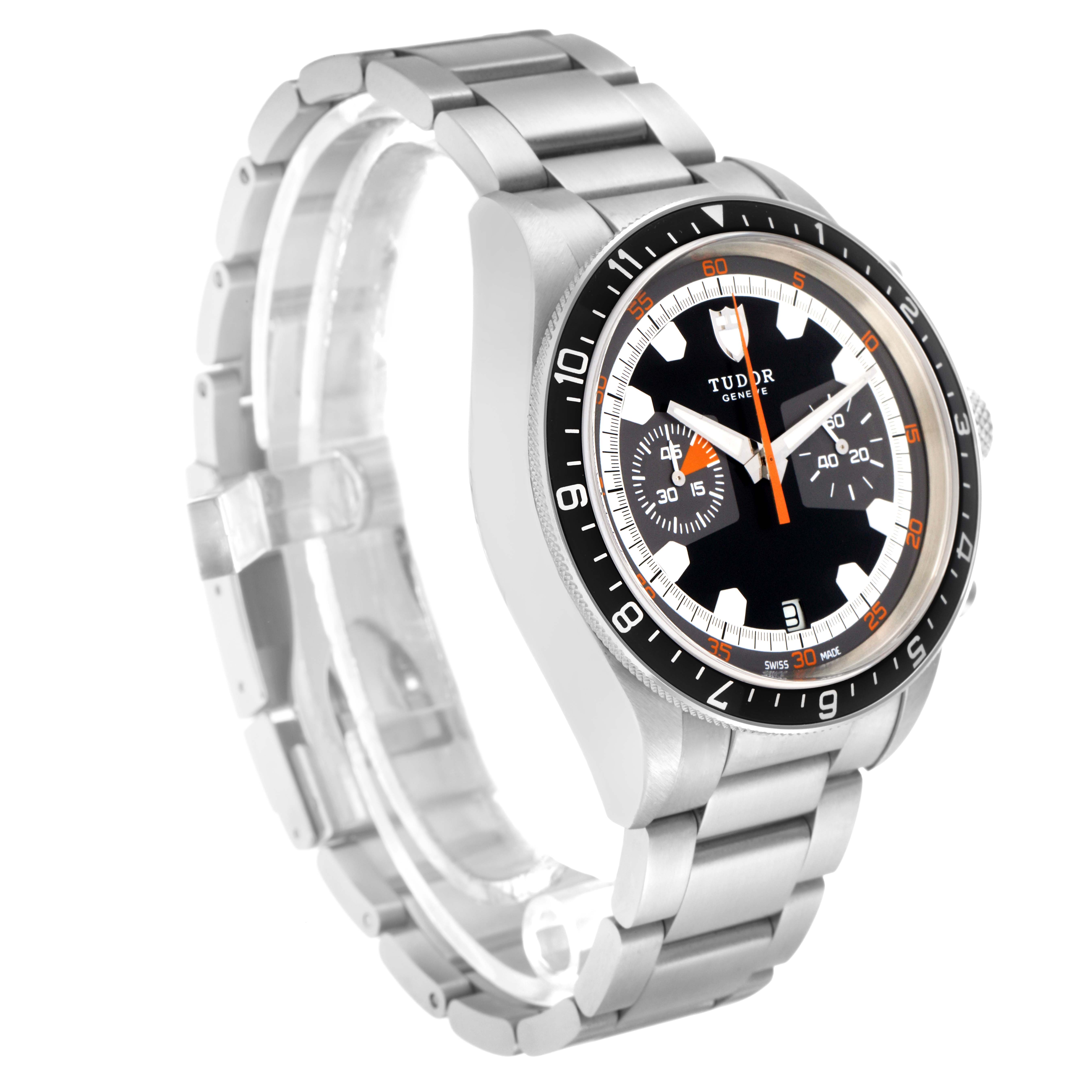 The Tudor Heritage Chrono model 70330N-65740 is shown from a front-left angle, showcasing the dial, bezel, and stainless steel bracelet.