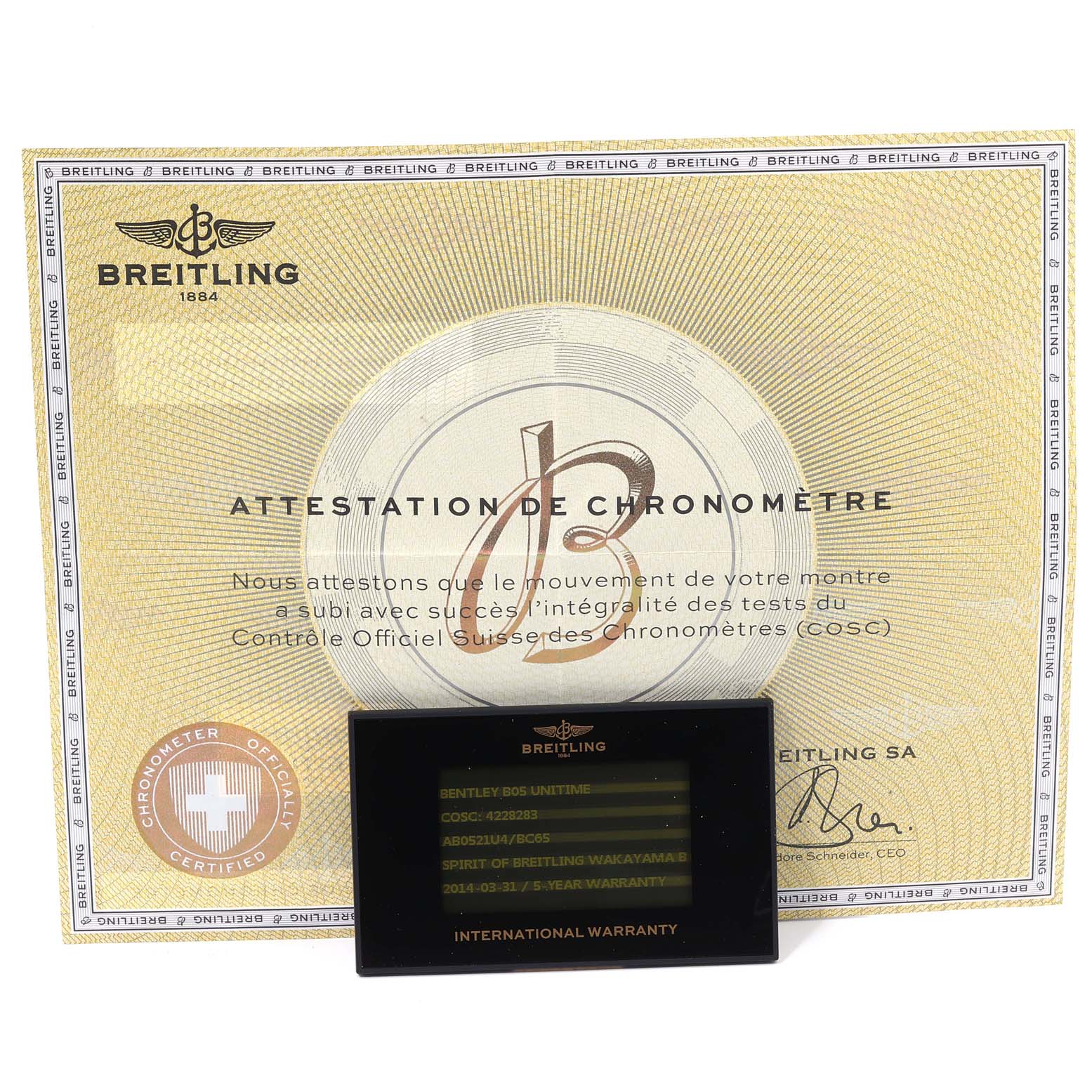 The image shows the Bentley model by Breitling's chronometer certificate and international warranty card.