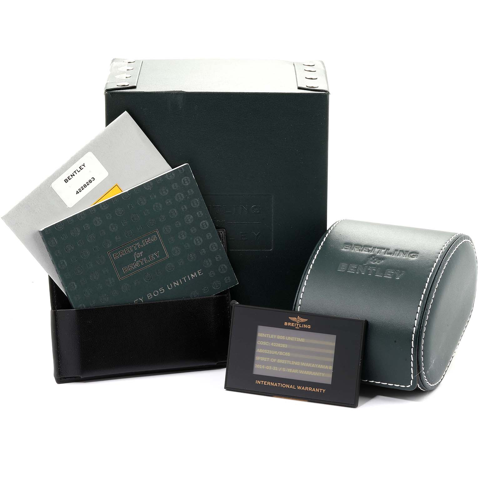 The image shows the packaging and accessories for the Bentley model by Breitling, including a box, documents, and a warranty card.