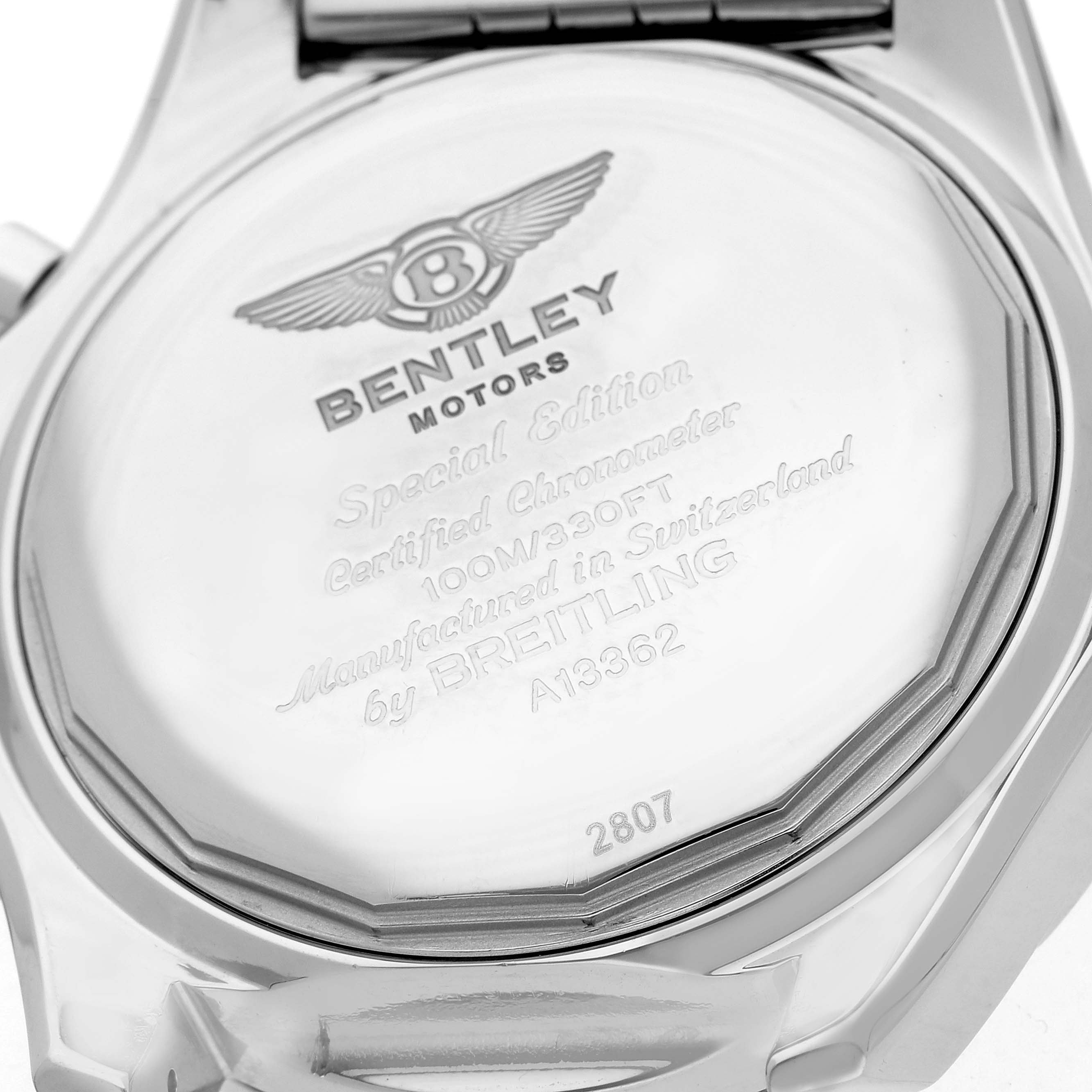 The image shows the back case of a Breitling Bentley A13362 Men
s Stainless Steel Mother of Pearl Dial A13362 Men
s Stainless Steel Mother of Pearl Dial watch, highlighting engravings and branding details.