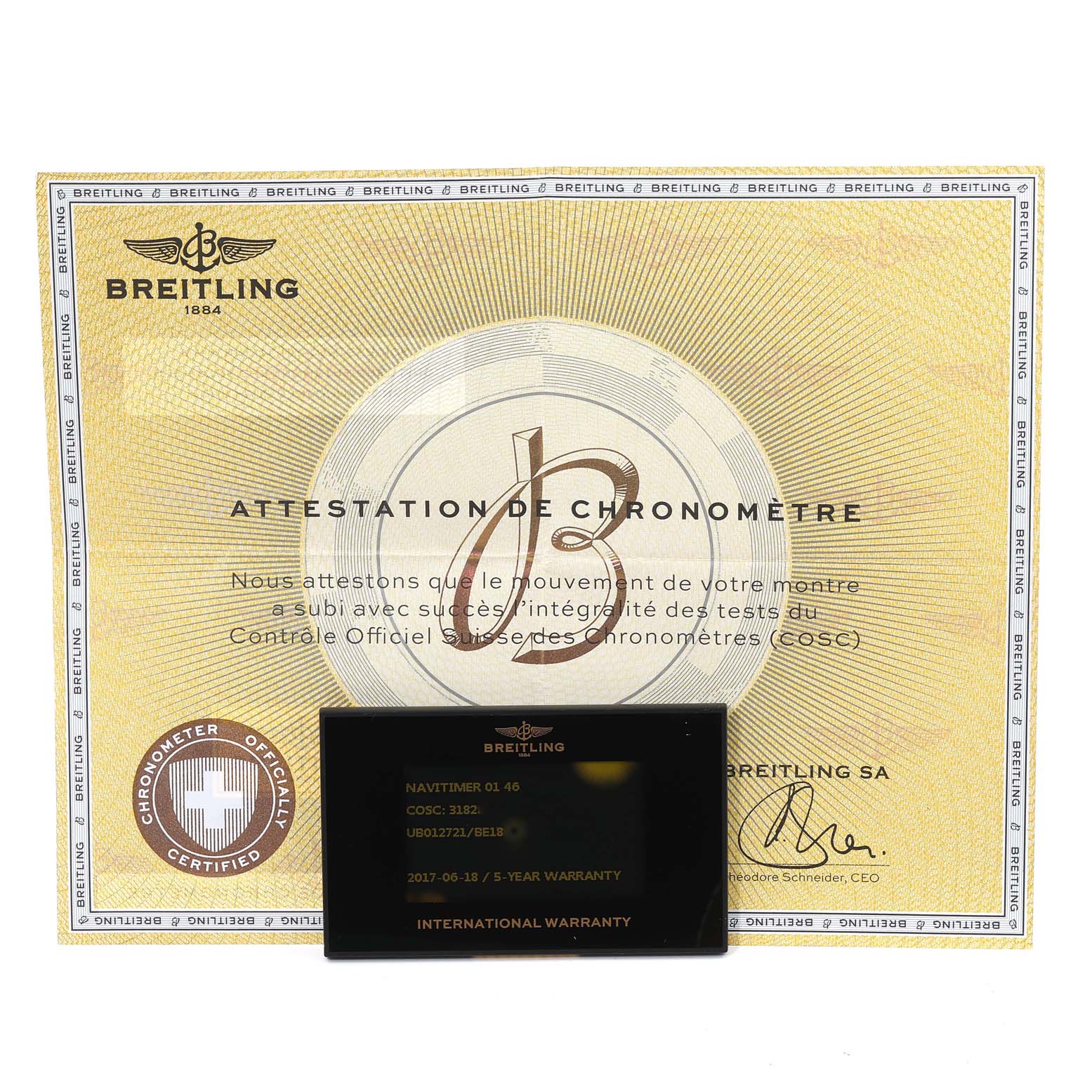 The image shows the certification and warranty card for a Breitling Navitimer UB0127 Men
s Steel and Gold (two tone) Black Dial UB0127 Men
s Steel and Gold (two tone) Black Dial model 01.46 watch.