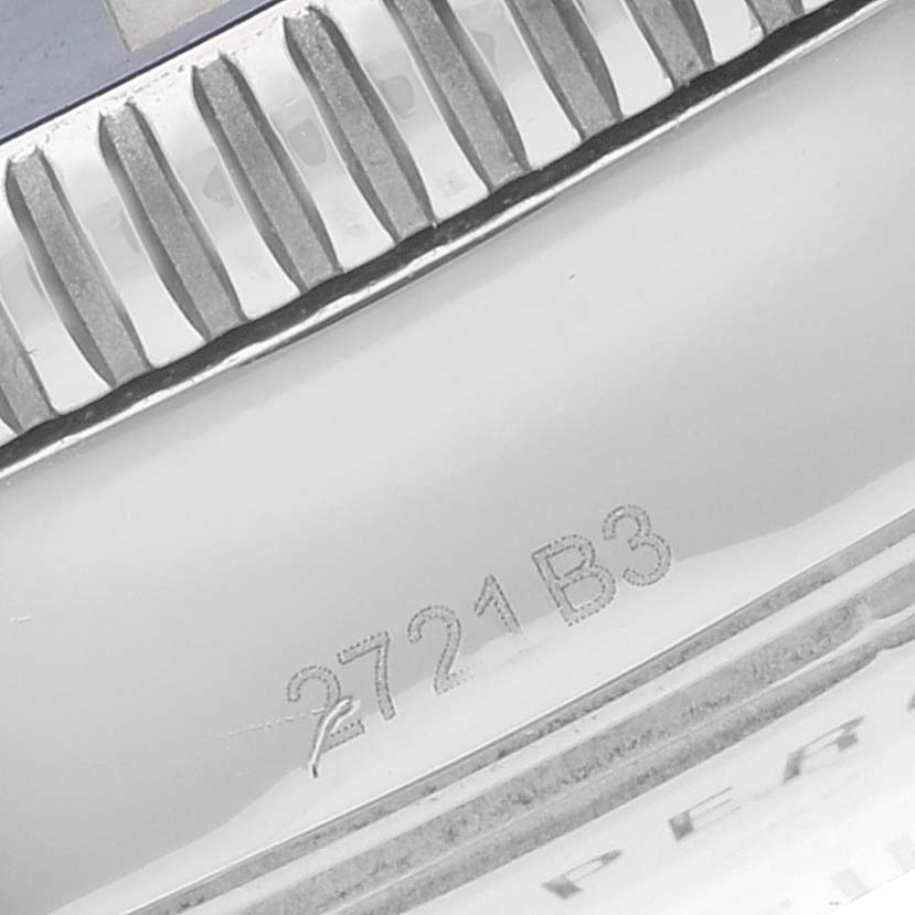 The image shows a close-up of the bezel and engraved details on the side of a Breitling Superocean AB2020 Men's Stainless Steel Blue Dial AB2020 Men's Stainless Steel Blue Dial watch.