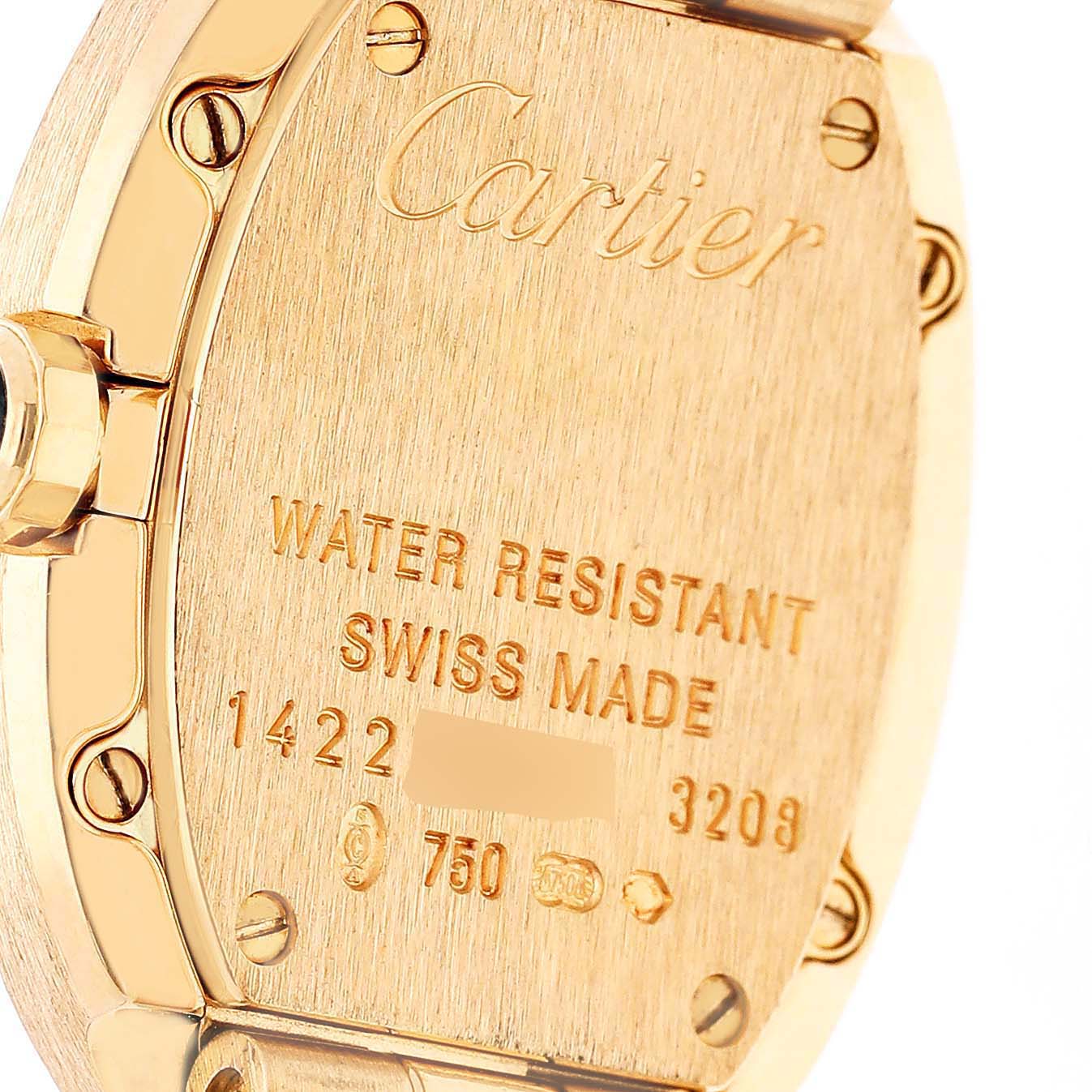 The image shows the back of the Cartier Baignoire W8000008 Women's Yellow Gold Silver Dial watch, highlighting the engravings and screws.