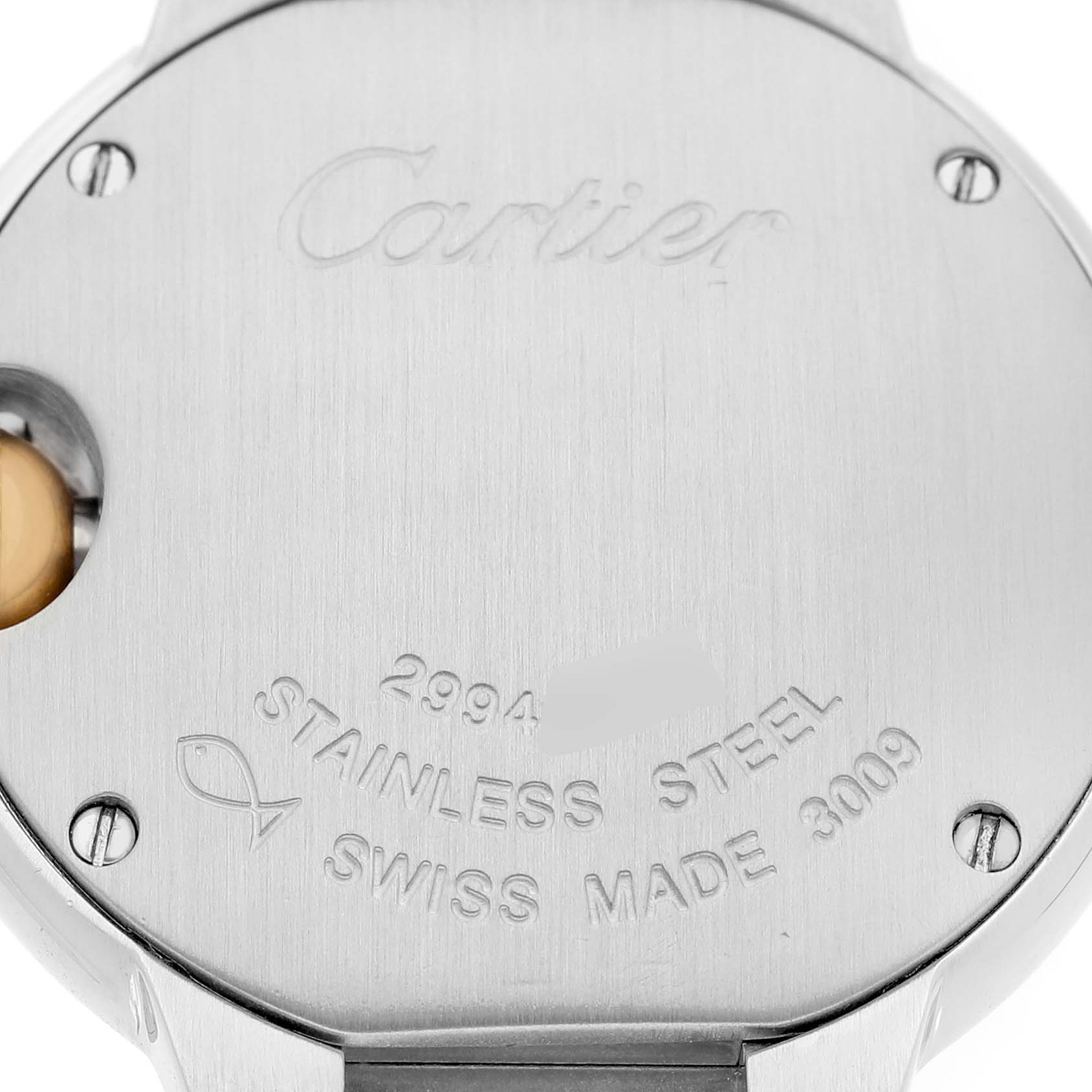 The image shows the back case of a Cartier Ballon Bleu W69007Z3 Women's Steel and Gold (two tone) Silver Dial watch, highlighting engravings and screws.