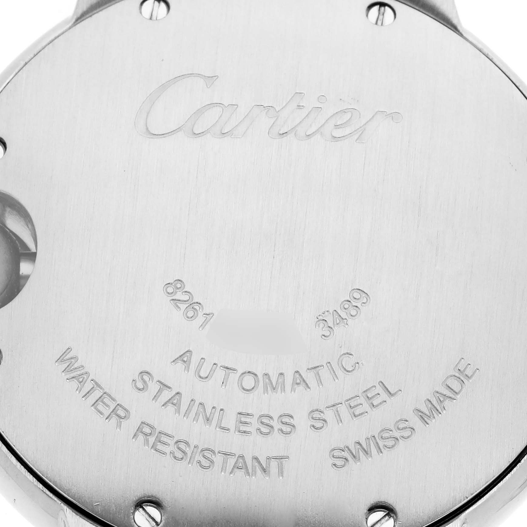 The image shows the back of a Cartier Ballon Bleu W6920100 Women
s Stainless Steel Pink Dial W6920100 Women
s Stainless Steel Pink Dial watch case, highlighting engraved details like brand, model, and material.