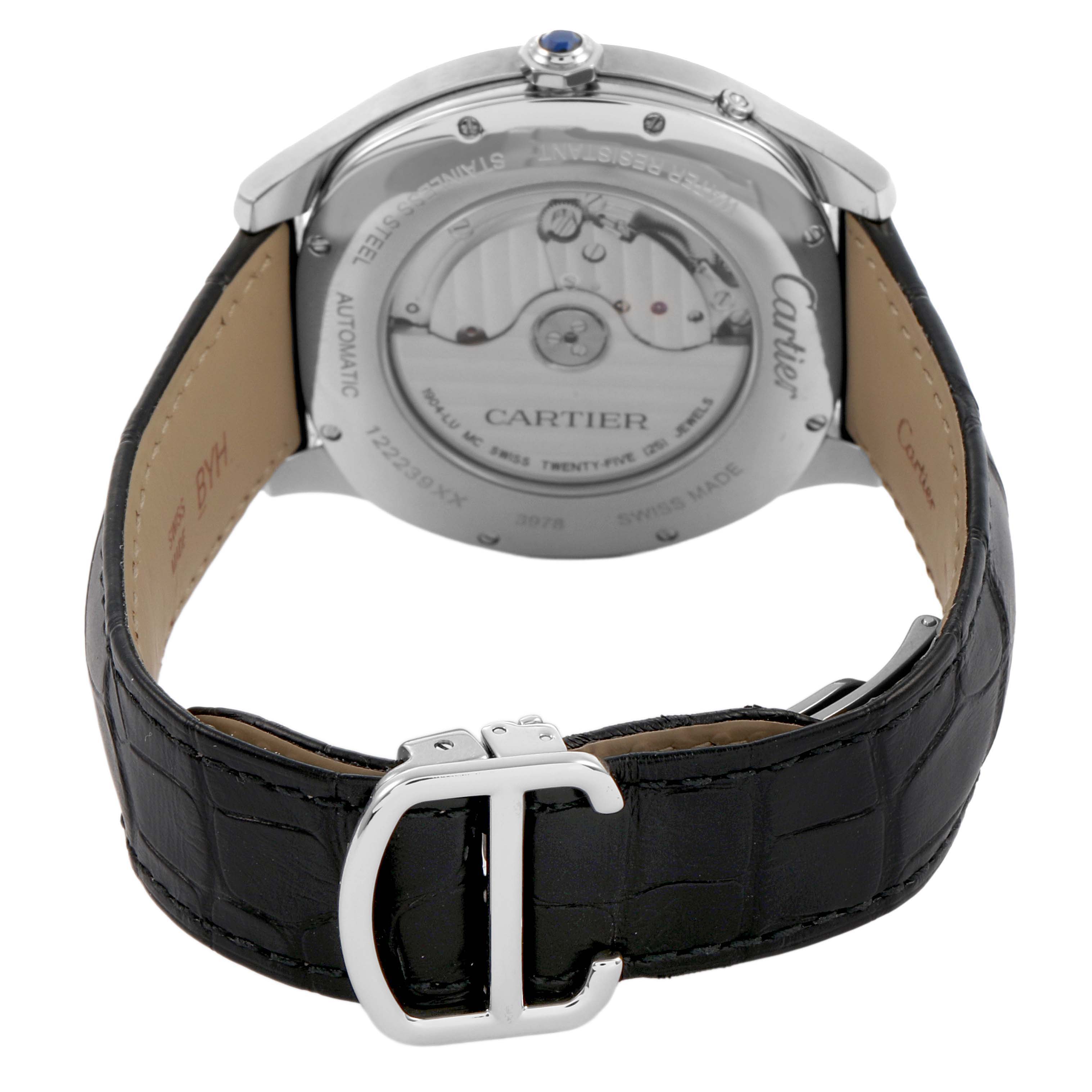 The Drive de Cartier watch is shown from the back, highlighting the transparent case back, movement, leather strap, and buckle.