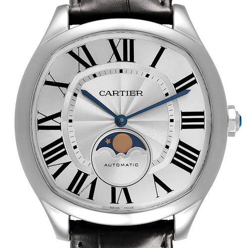 The Drive de Cartier watch is shown from a front angle, highlighting the dial, Roman numerals, moon phase, and steel case.