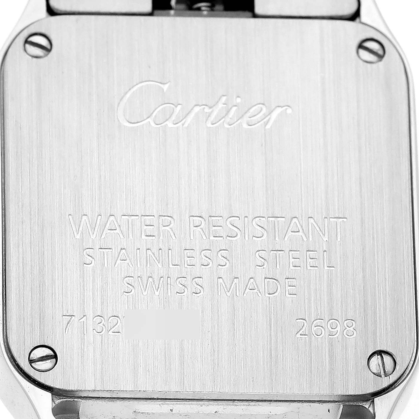 The image shows the case back of a Cartier Santos Demoiselle W25064Z5 Women's Stainless Steel Silver Dial watch, highlighting the brand engraving and specifications.