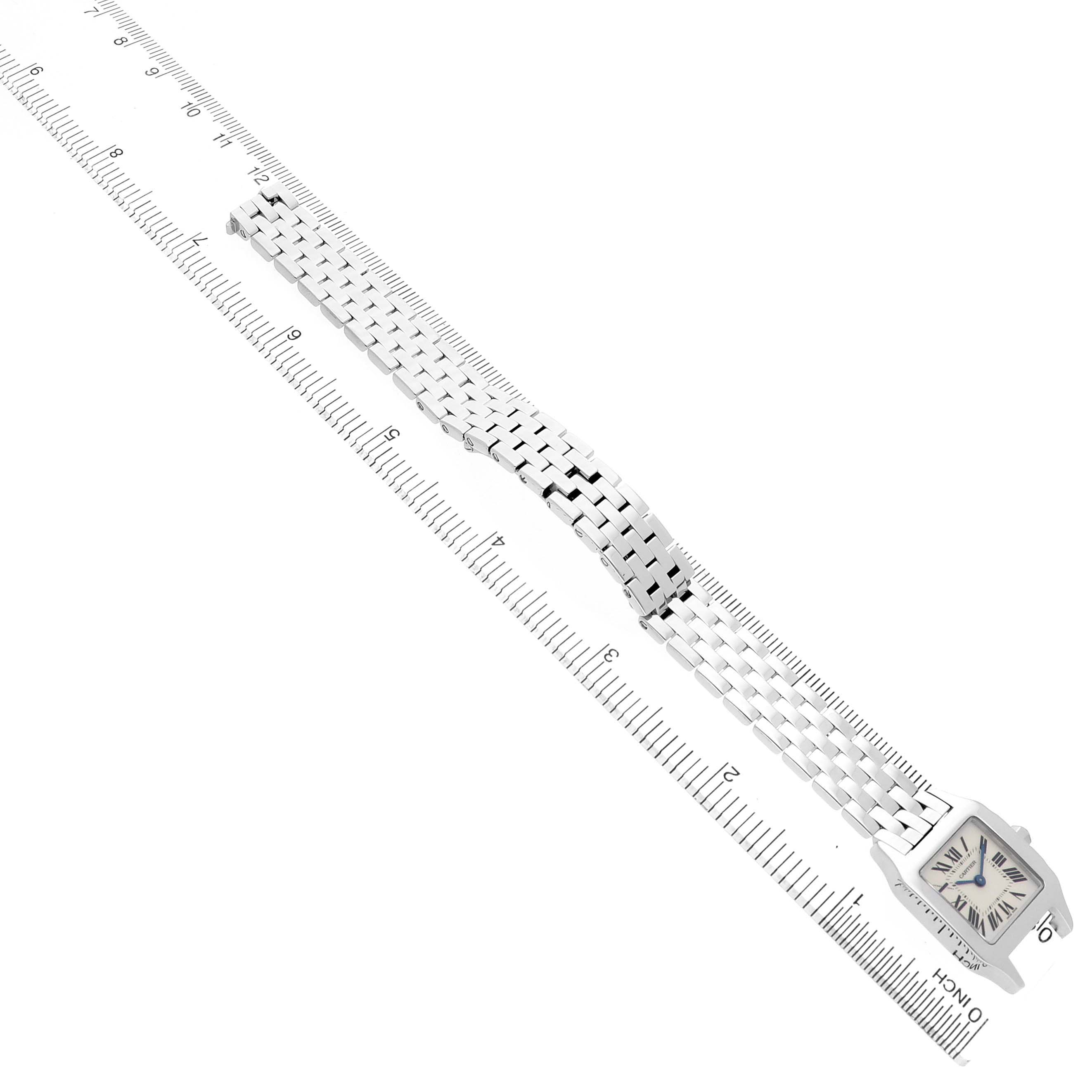 The image shows the Cartier Santos Demoiselle W25064Z5 Women's Stainless Steel Silver Dial watch from an angled top view, highlighting the face and full bracelet laid out.