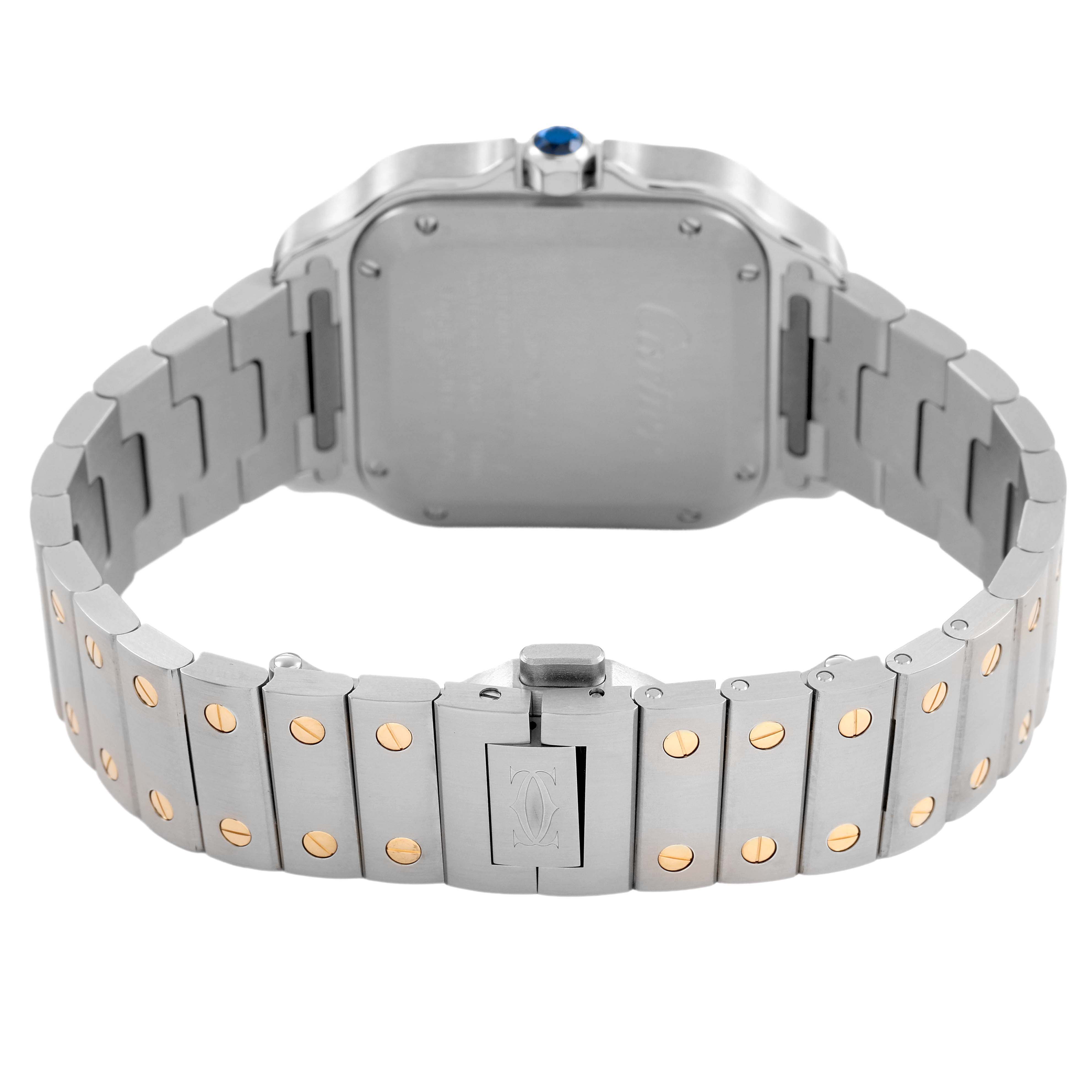 The image shows the back and bracelet of a Cartier Santos W2SA0016 Men's Stainless Steel Silver Dial watch, highlighting the metal links and clasp.