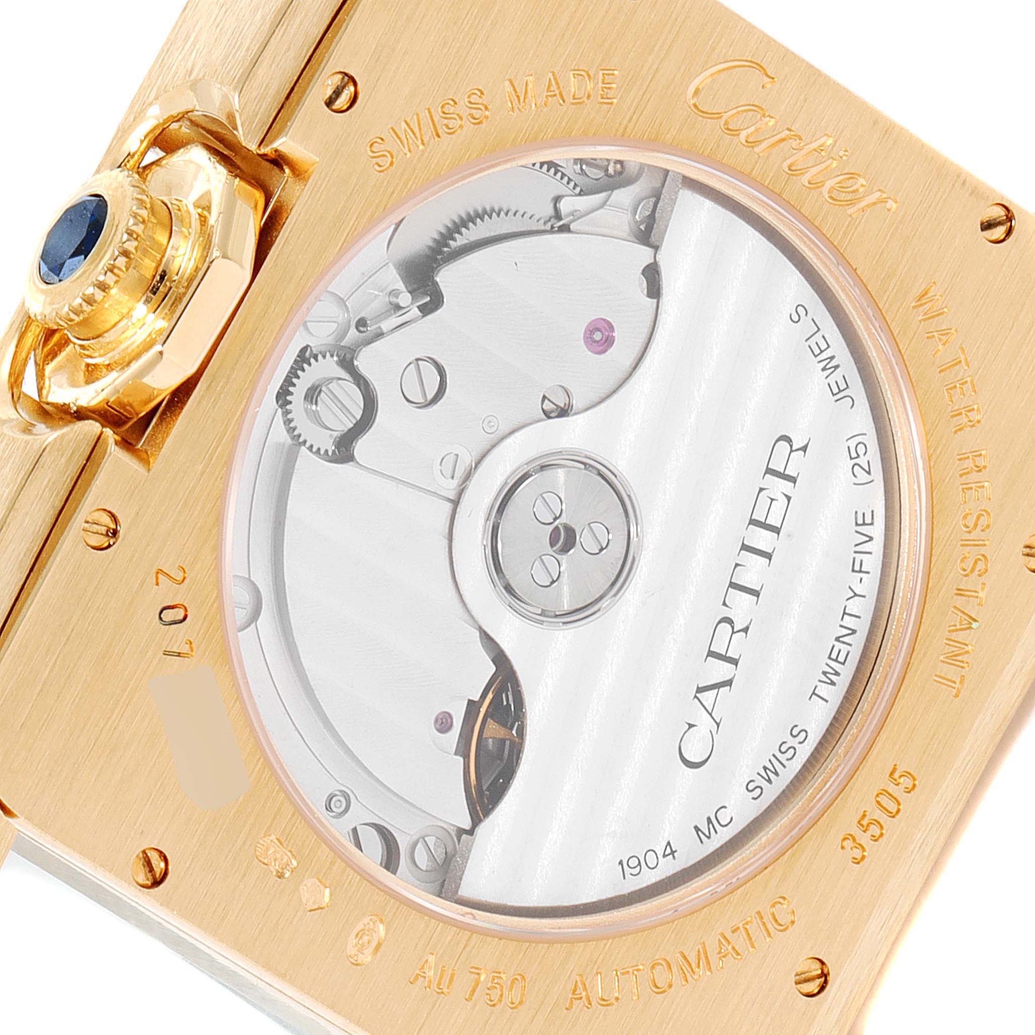 The image shows the back of a Cartier Tank Anglaise W5310032 Men's Yellow Gold Silver Dial W5310032 Men's Yellow Gold Silver Dial watch, revealing its automatic movement and engravings.