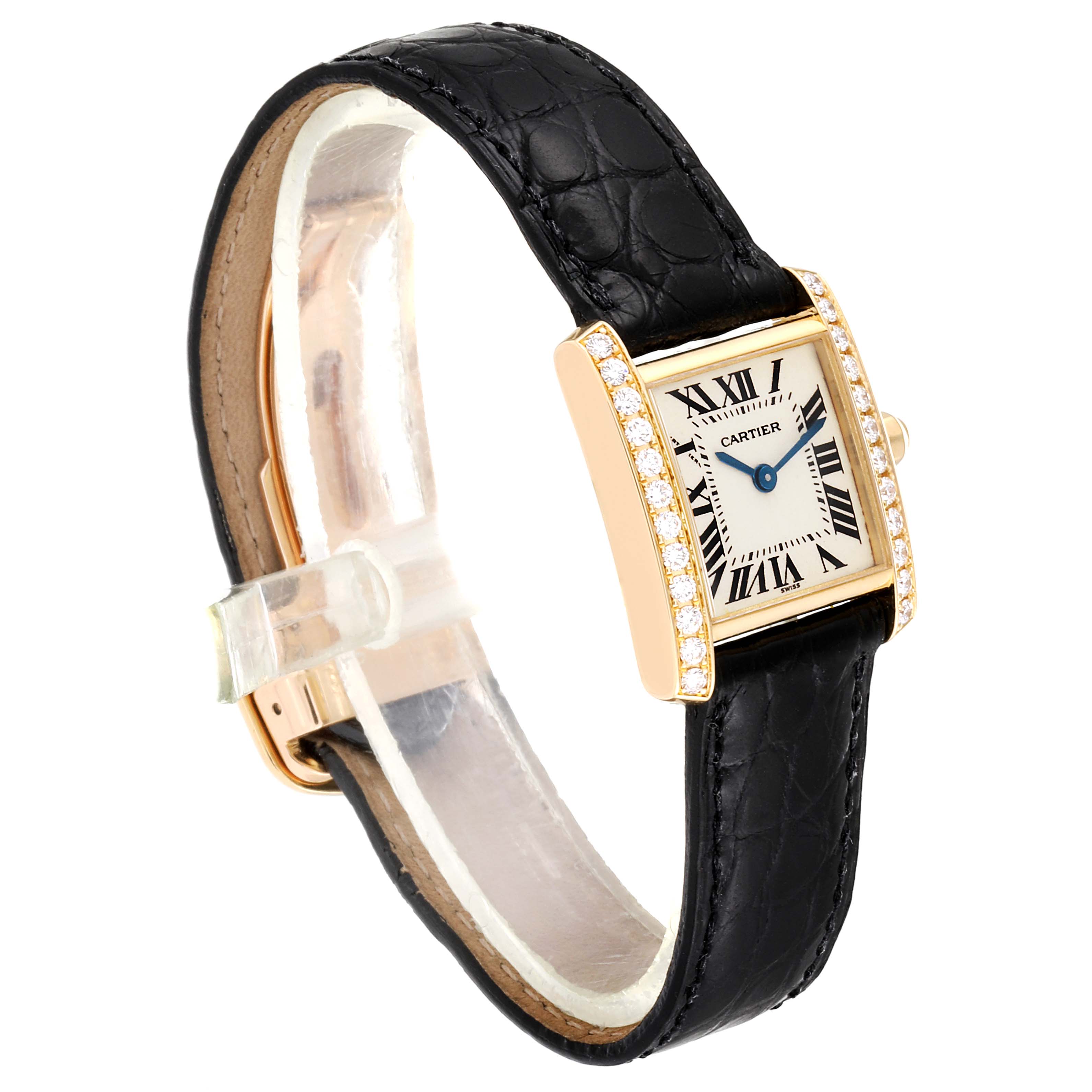 The image shows a Cartier Tank Francaise WE100131 Women's Yellow Gold Silver Dial WE100131 Women's Yellow Gold Silver Dial watch at a three-quarter angle, highlighting its rectangular dial, diamond bezel, and black leather strap.