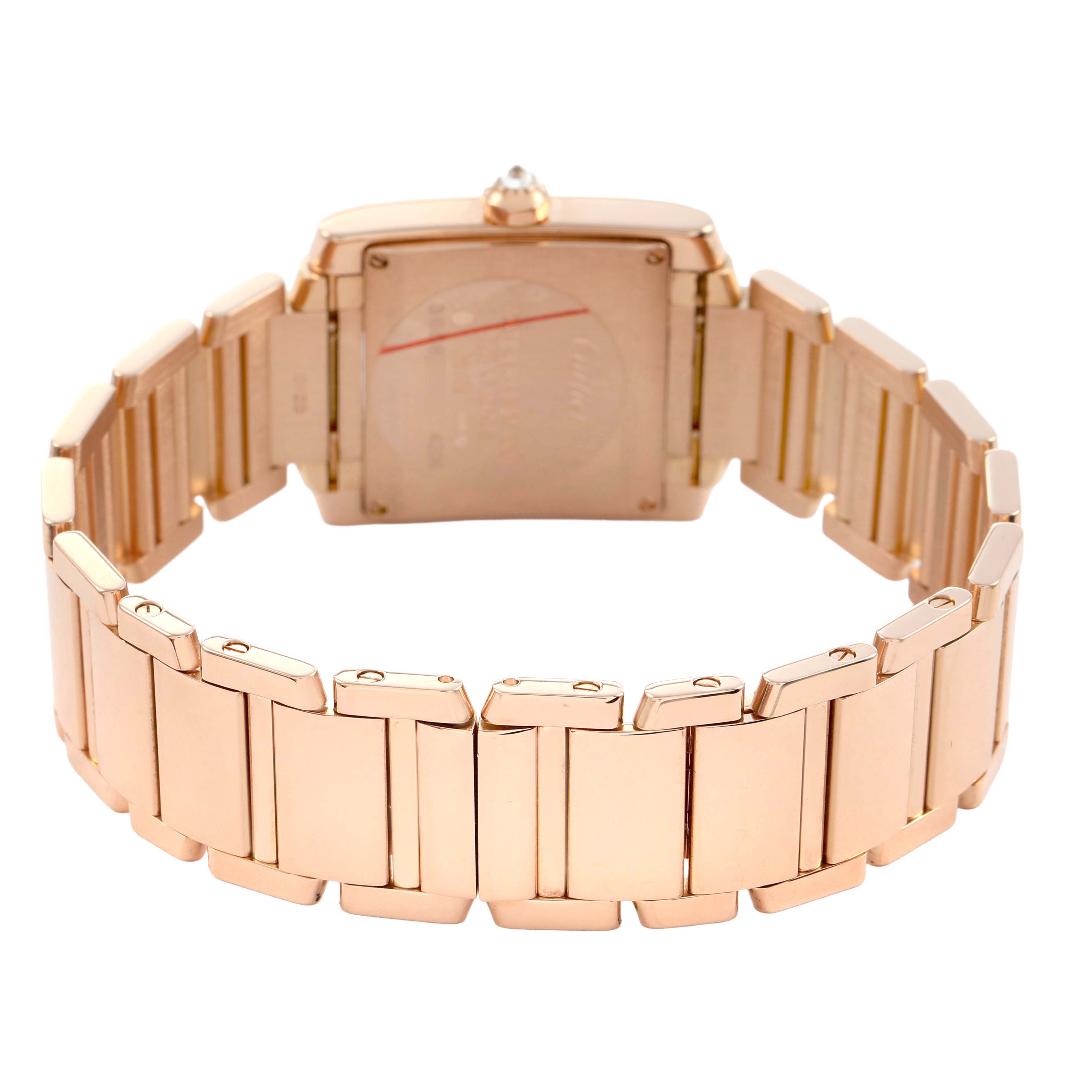 The Cartier Tank Francaise WJTA0023 Women's Rose Gold Silver Dial watch is shown from the back, highlighting its bracelet and case back.