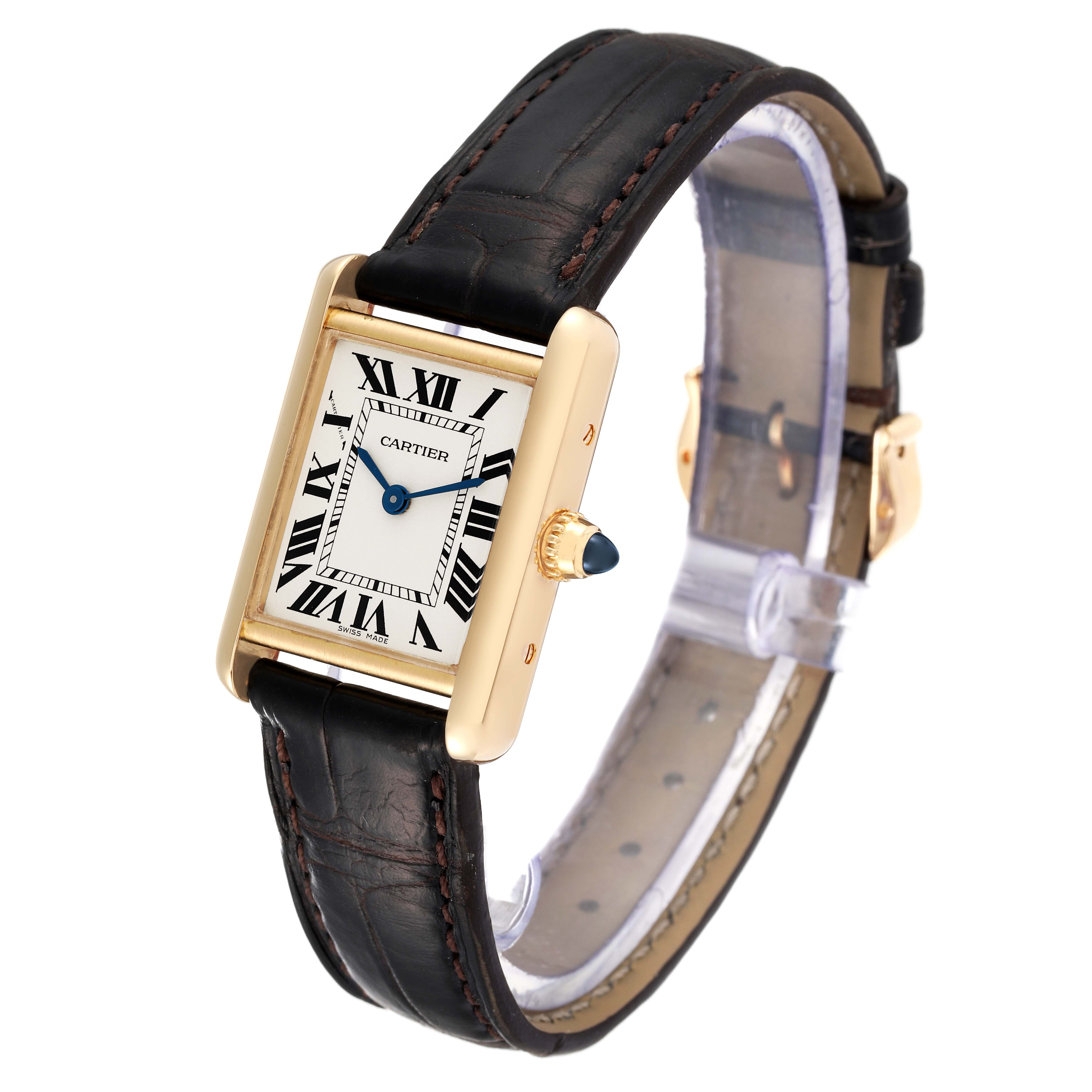 The image shows a Cartier Tank Louis W1529856 Women's Yellow Gold Silver Dial W1529856 Women's Yellow Gold Silver Dial watch at a three-quarter angle, highlighting its rectangular face, Roman numerals, and black leather strap.