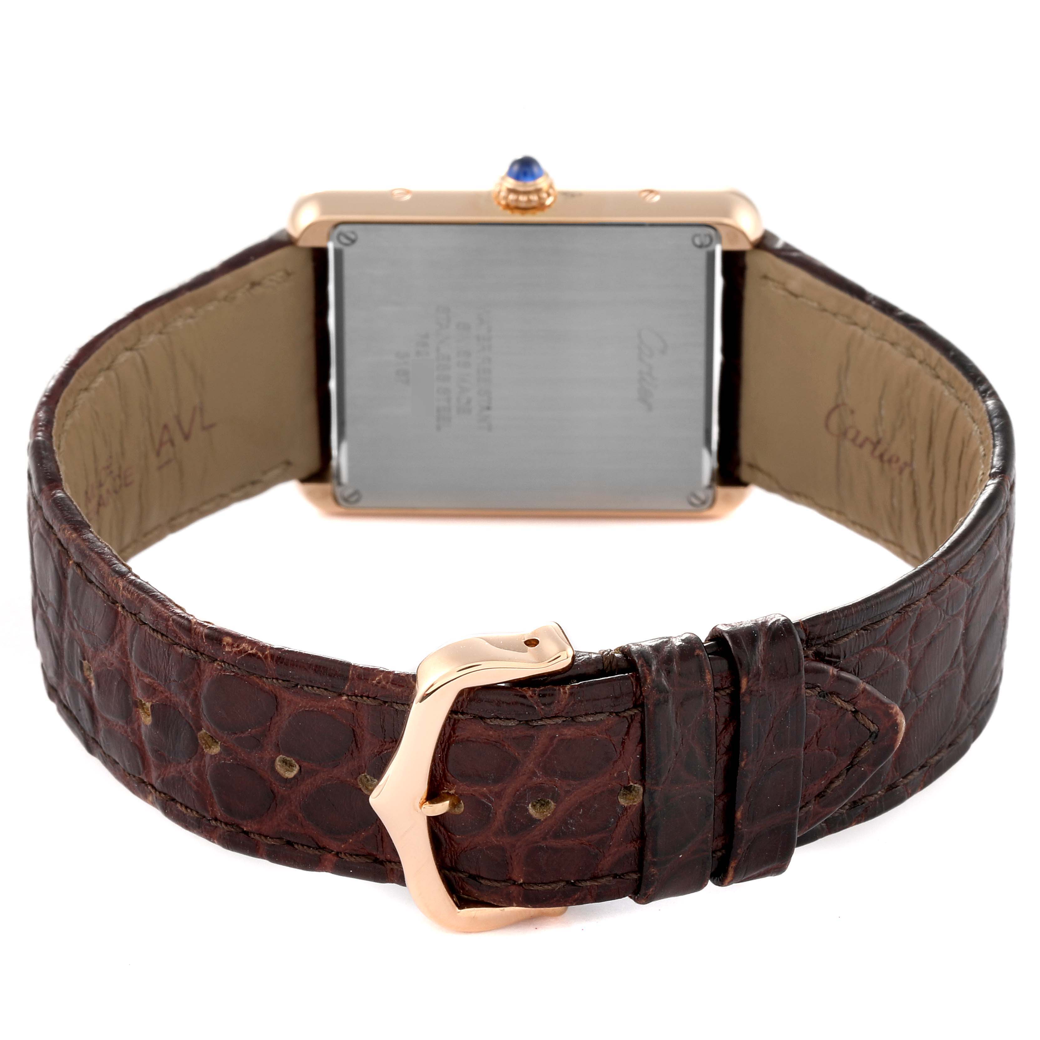 The image shows the back view of a Cartier Tank Solo W5200025 Men
s Rose Gold Silver Dial W5200025 Men
s Rose Gold Silver Dial watch, focusing on its leather strap and metallic buckle.