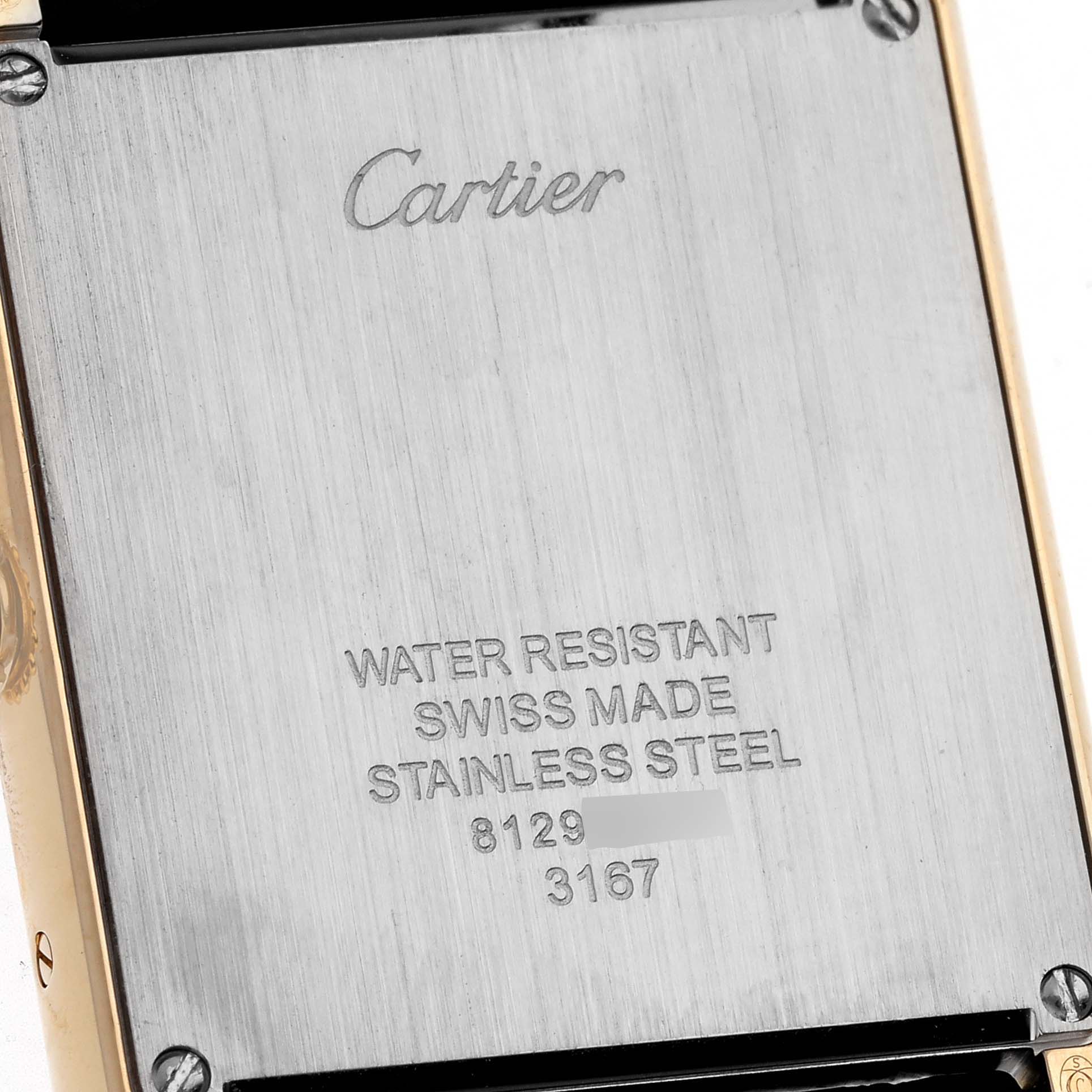 This image shows the back case of a Cartier Tank Solo W5200004 Men's Yellow Gold Silver Dial W5200004 Men's Yellow Gold Silver Dial watch with engraved specifications.
