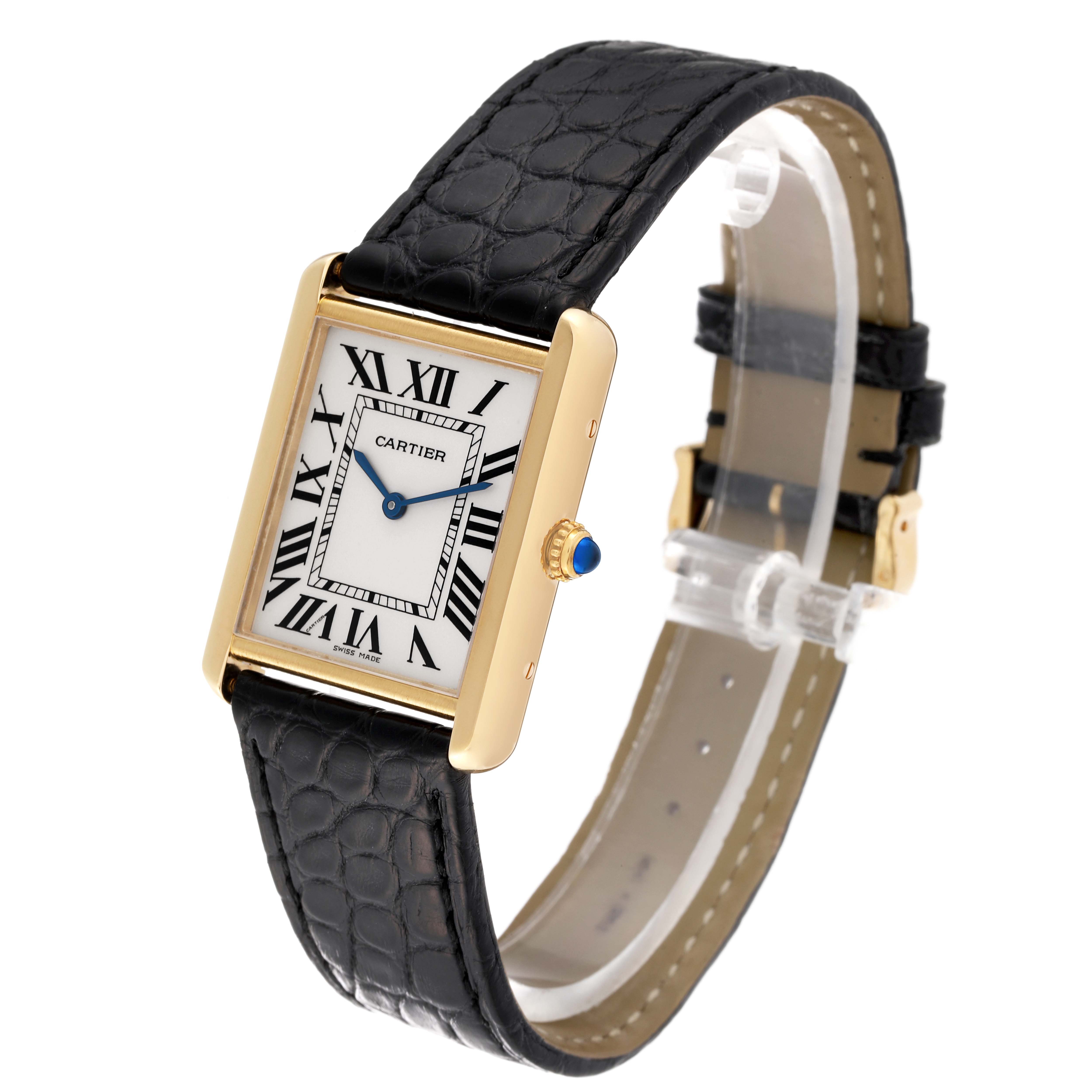The image shows a Cartier Tank Solo 62230 Men
s Yellow Gold Silver Dial 62230 Men
s Yellow Gold Silver Dial watch at an angled view, highlighting the rectangular face, Roman numerals, crown, and leather strap.