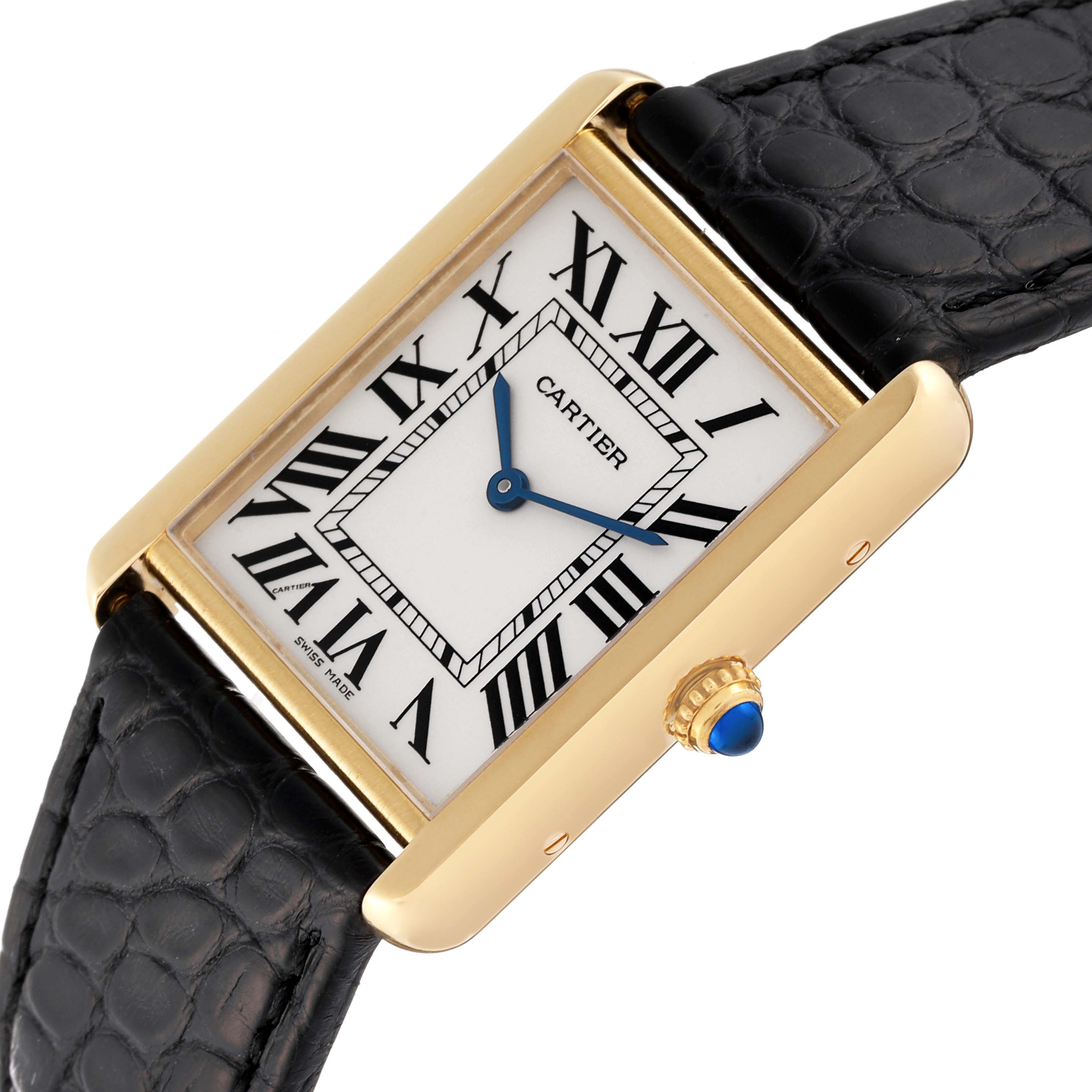 This image shows a Cartier Tank Solo 62230 Men
s Yellow Gold Silver Dial 62230 Men
s Yellow Gold Silver Dial watch at an oblique angle, highlighting its face, Roman numerals, and black strap.