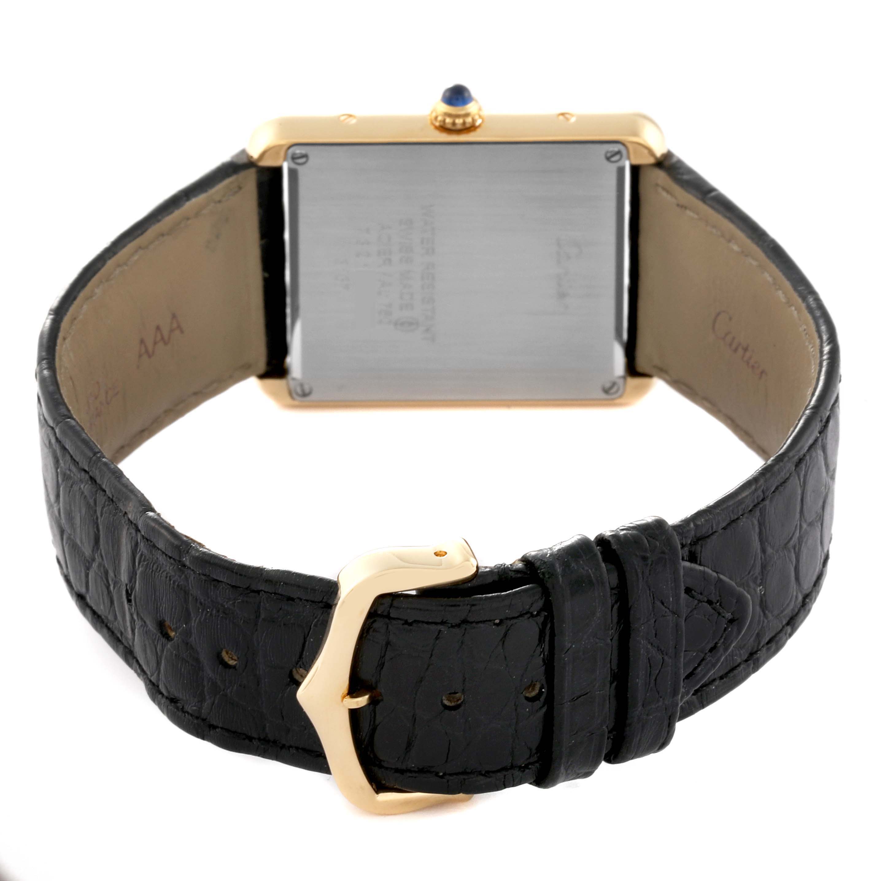 This image shows the back and clasp of a Cartier Tank Solo W5200004 Men
s Yellow Gold Silver Dial W5200004 Men
s Yellow Gold Silver Dial watch, highlighting the case back and leather strap.