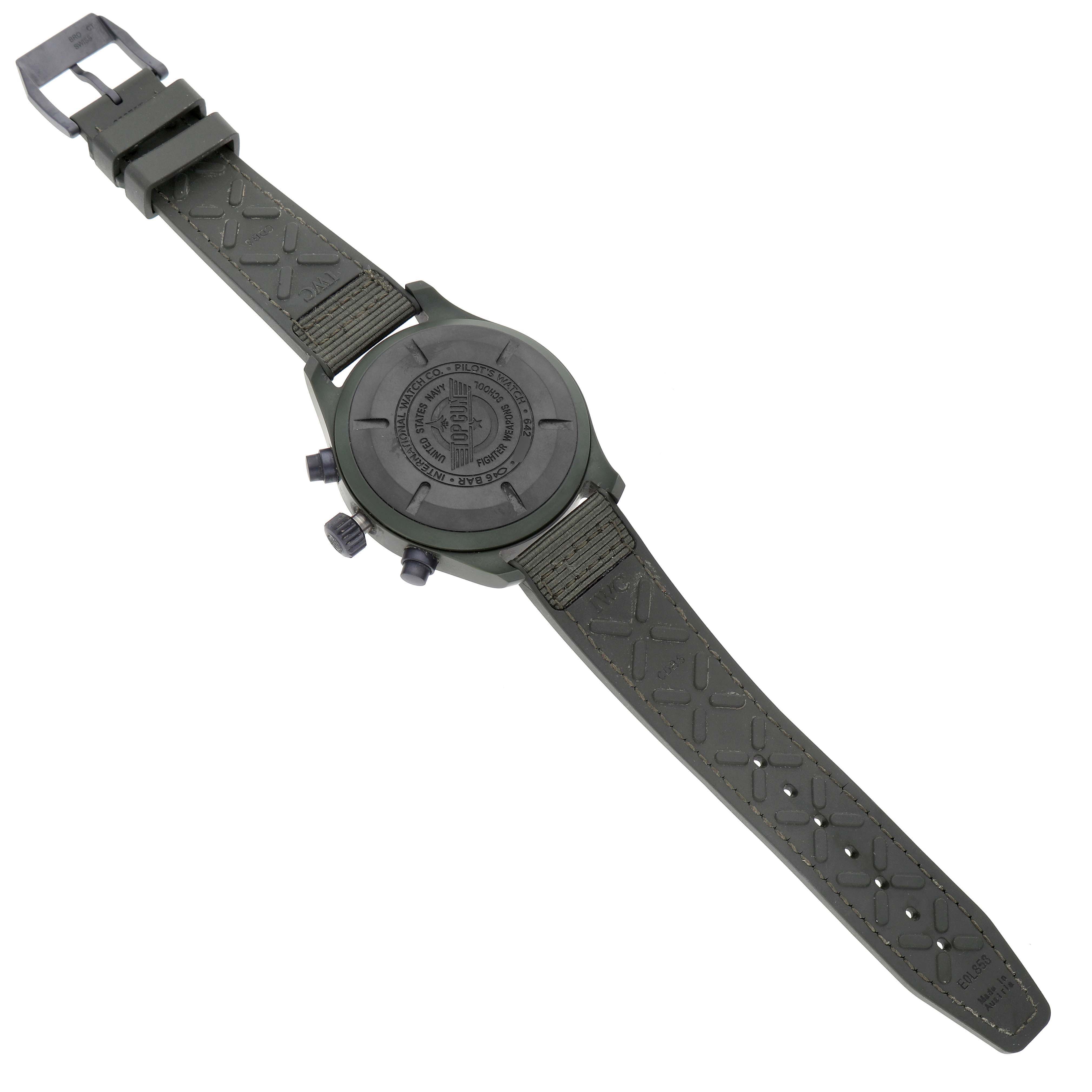 The image shows the back and side view of an IWC Pilot IW389106 Men's Ceramic Green Dial model watch, highlighting the case back, crown, and strap.
