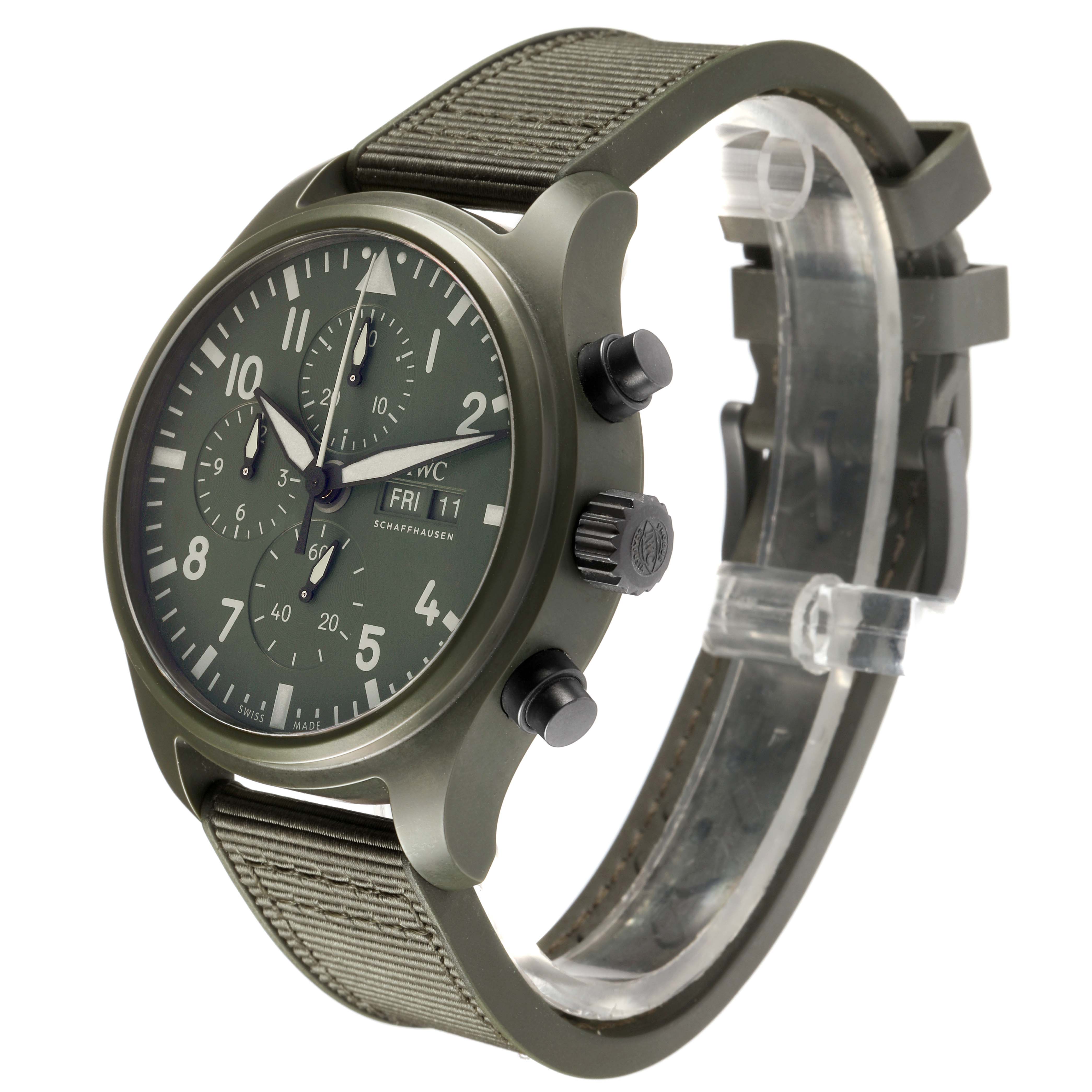 The IWC Pilot IW389106 Men's Ceramic Green Dial watch is shown at a three-quarter angle, highlighting the dial, crown, pushers, and strap.