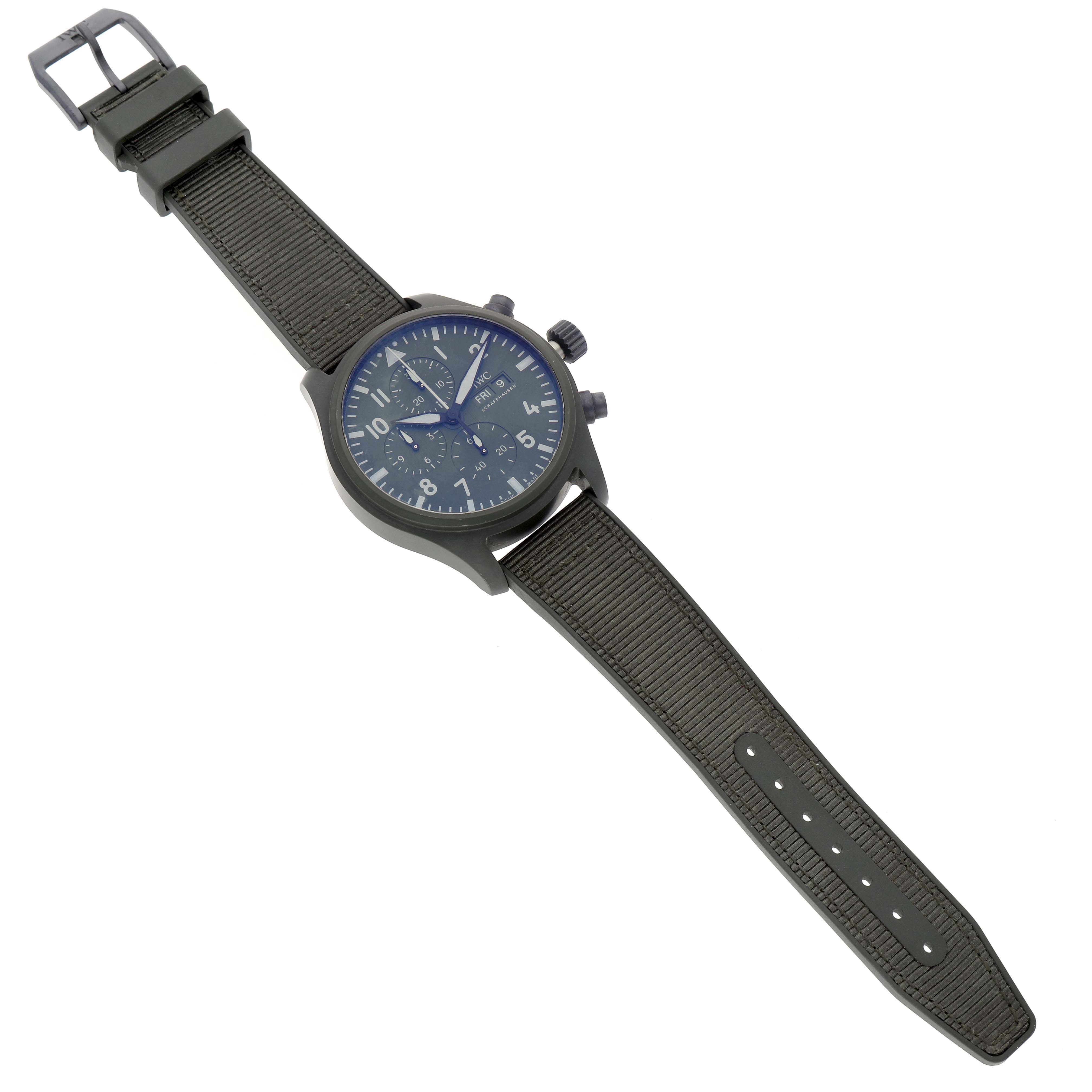 The IWC Pilot IW389106 Men's Ceramic Green Dial model watch is shown at a slight angle, displaying its face, strap, crown, and pushers.