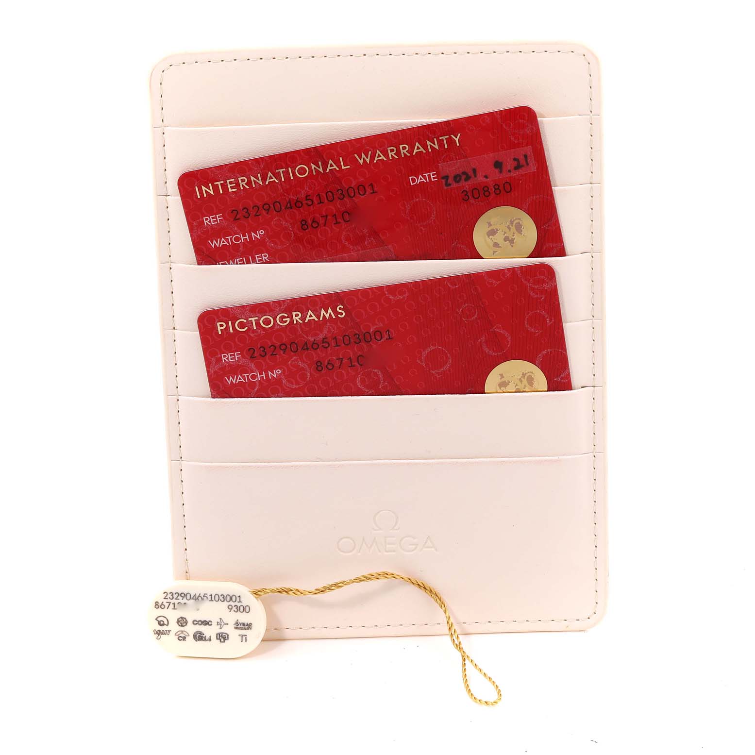 The image shows warranty cards and a tag for the Omega Planet Ocean 232.90.46.51.03.001 Men
s Titanium Blue Dial 232.90.46.51.03.001 Men
s Titanium Blue Dial model, displayed in a white cardholder.