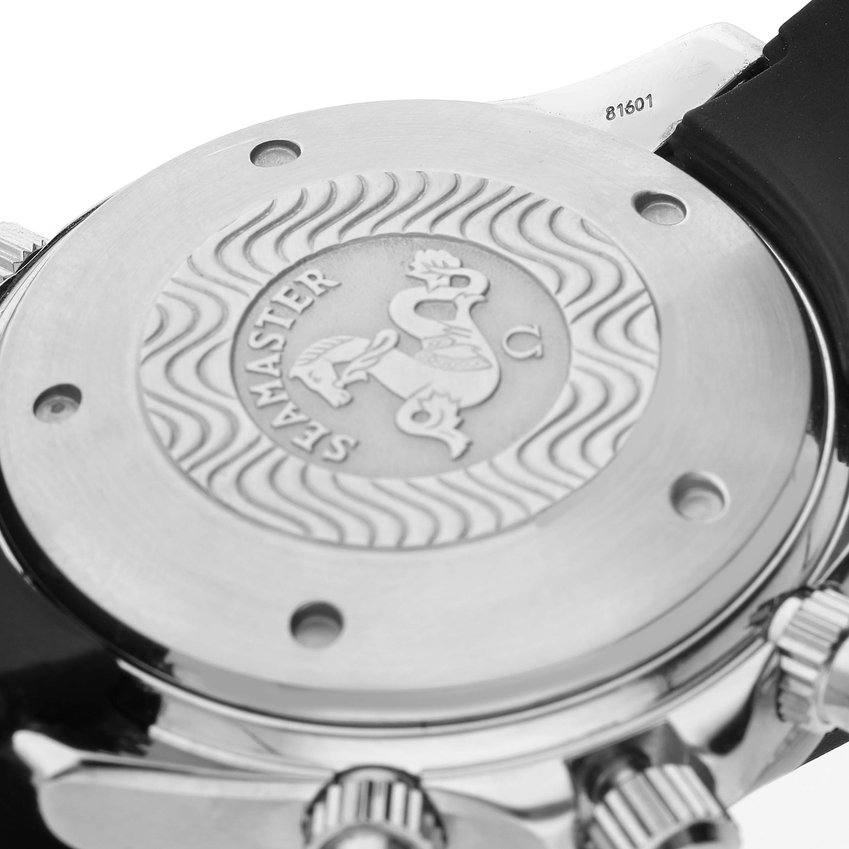 The image shows the back casing of an Omega Seamaster 2599.80.00 Men's Stainless Steel Blue Dial 2599.80.00 Men's Stainless Steel Blue Dial watch, highlighting the engraved design and part of the strap.