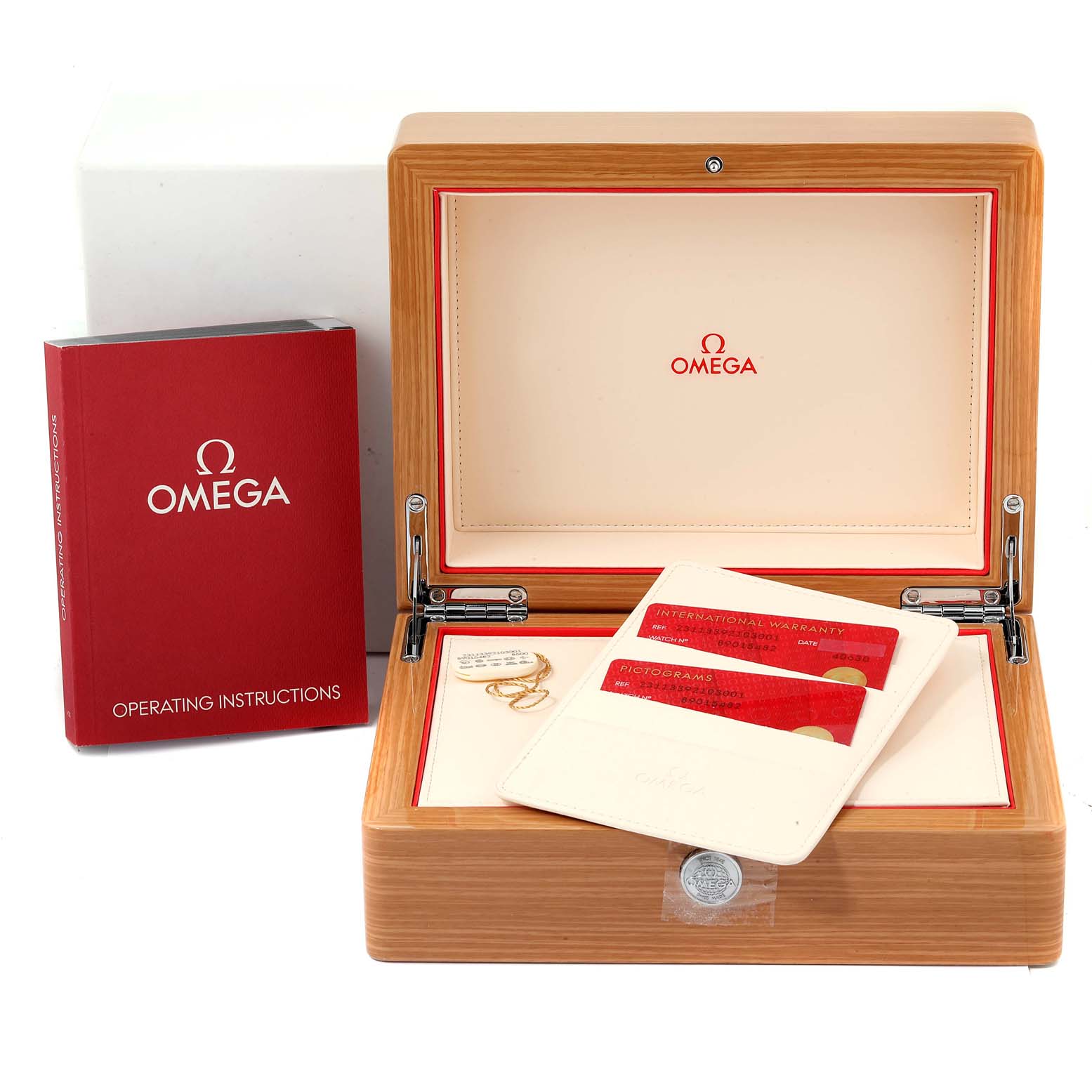 The image shows the box, operating instructions, warranty cards, and accessories for the Omega Aqua Terra  Men's Stainless Steel Blue Dial  Men's Stainless Steel Blue Dial watch.