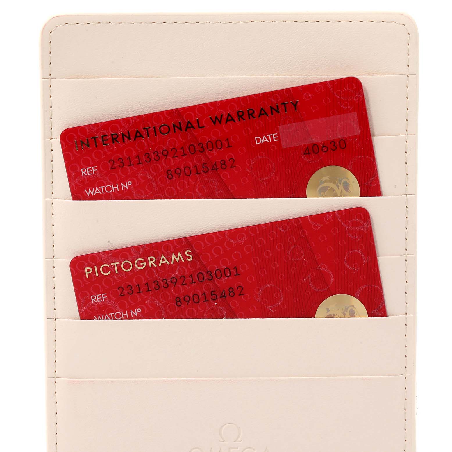 The image shows the warranty and pictograms cards for the Omega Aqua Terra  Men's Stainless Steel Blue Dial  Men's Stainless Steel Blue Dial model, displayed in a cream card holder.