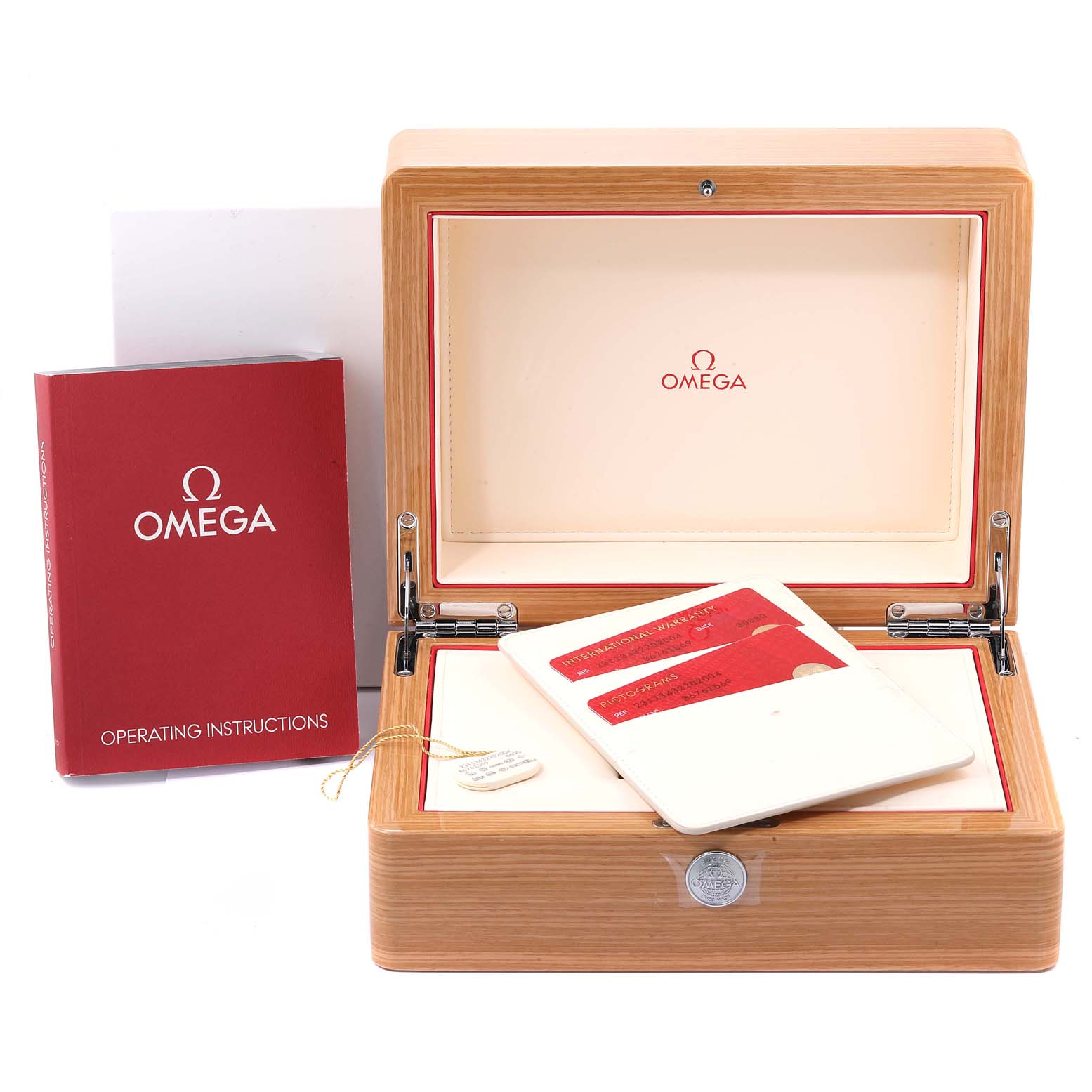 The image shows an open Omega Aqua Terra 231.13.43.22.02.004 Men
s Stainless Steel Silver Dial 231.13.43.22.02.004 Men
s Stainless Steel Silver Dial watch box, an operating manual, and warranty cards.